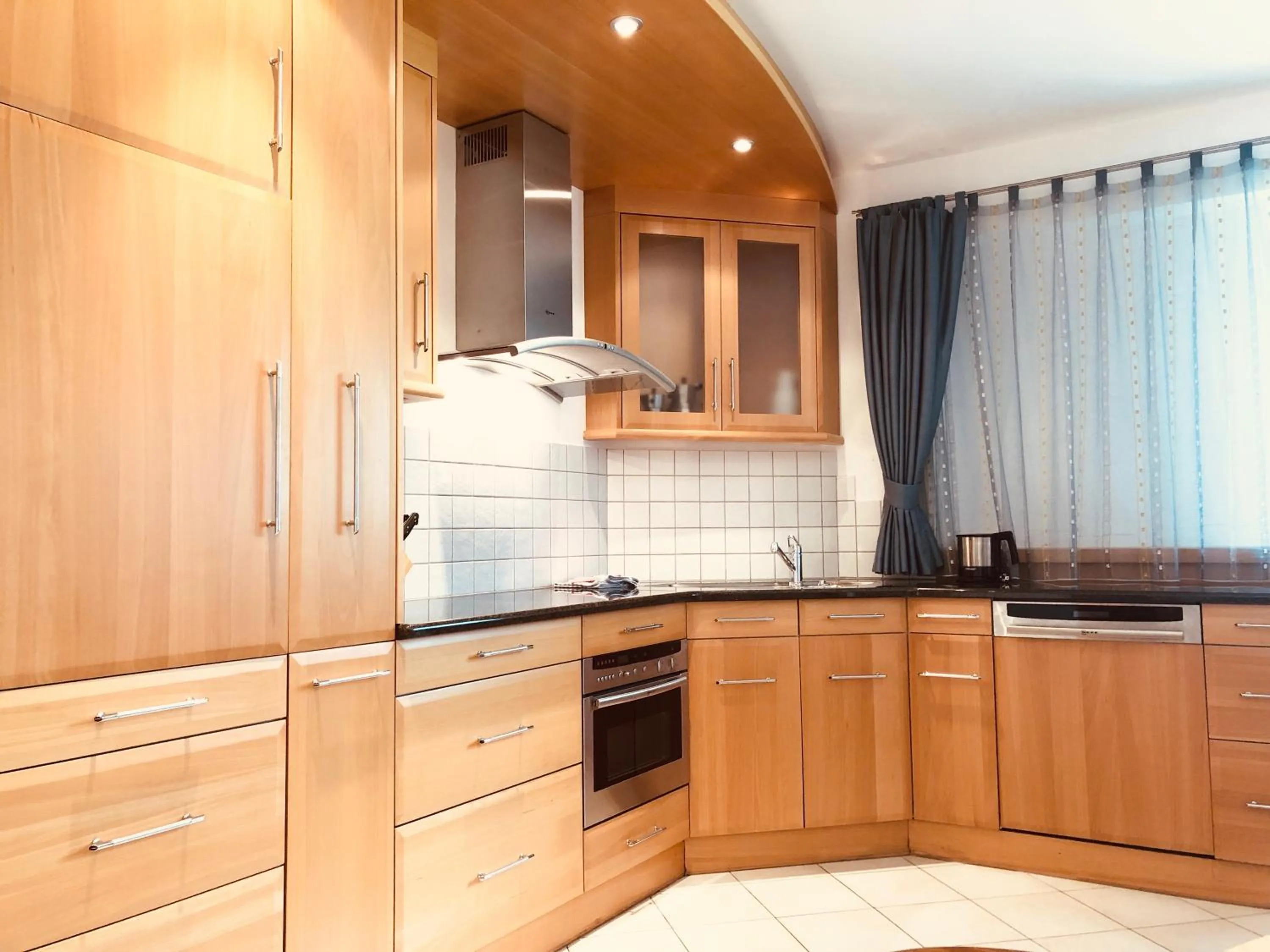 Kitchen or kitchenette in Apartments Sunela