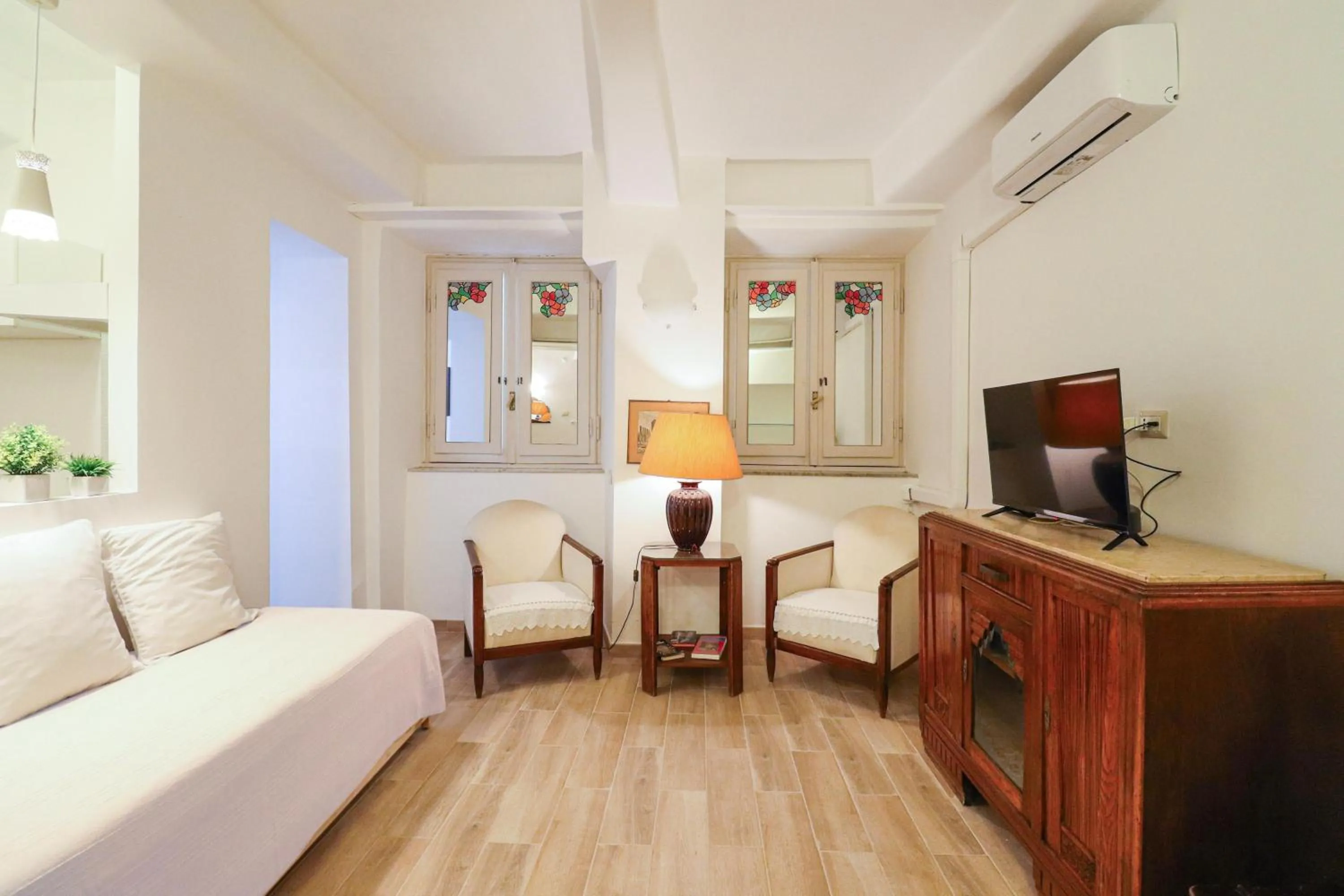 Living room, Bed in Locanderia Roma