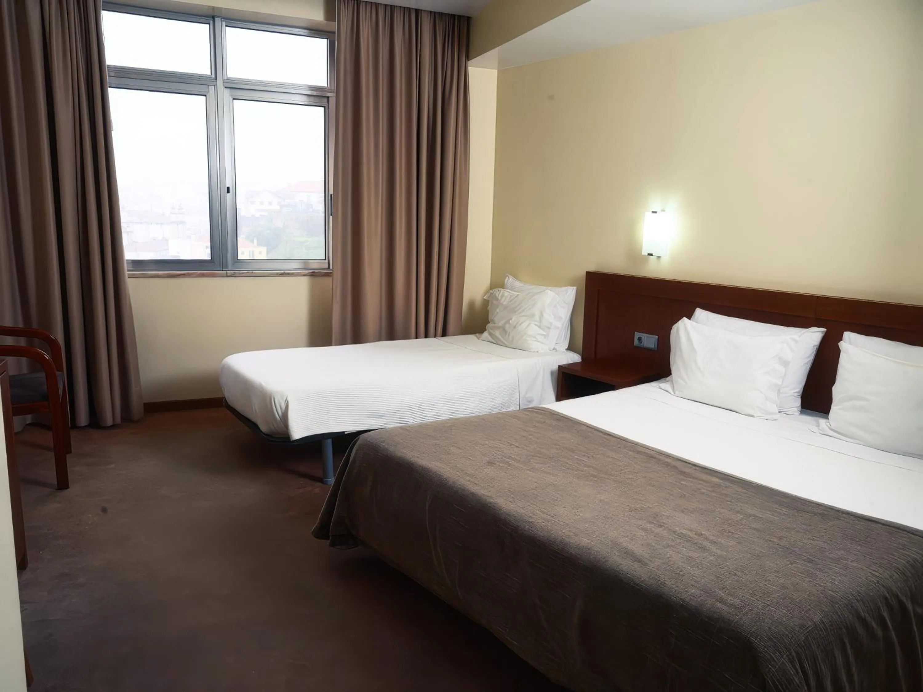 Bed in Hotel São Francisco