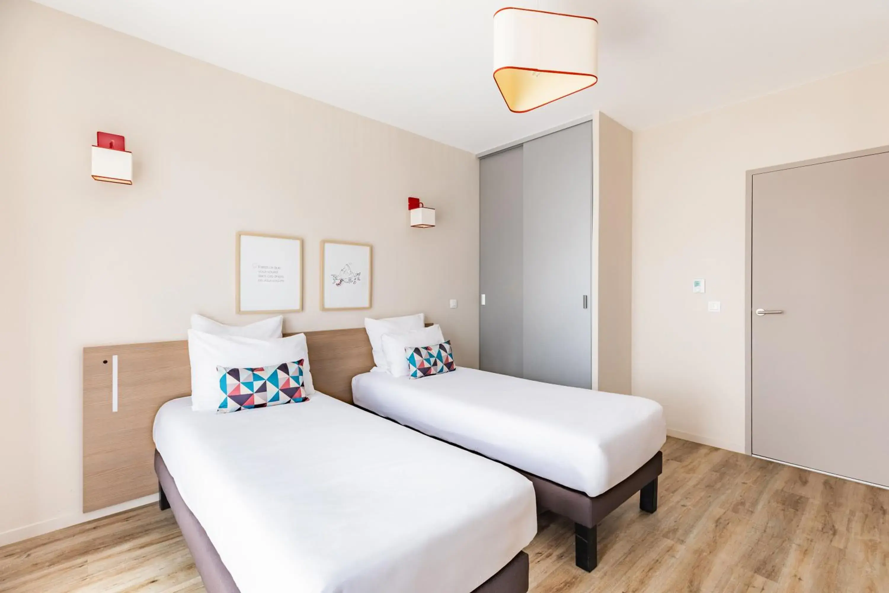 Bed in Appart'City Confort Cherbourg Bed in Appart'City Confort Cherbourg