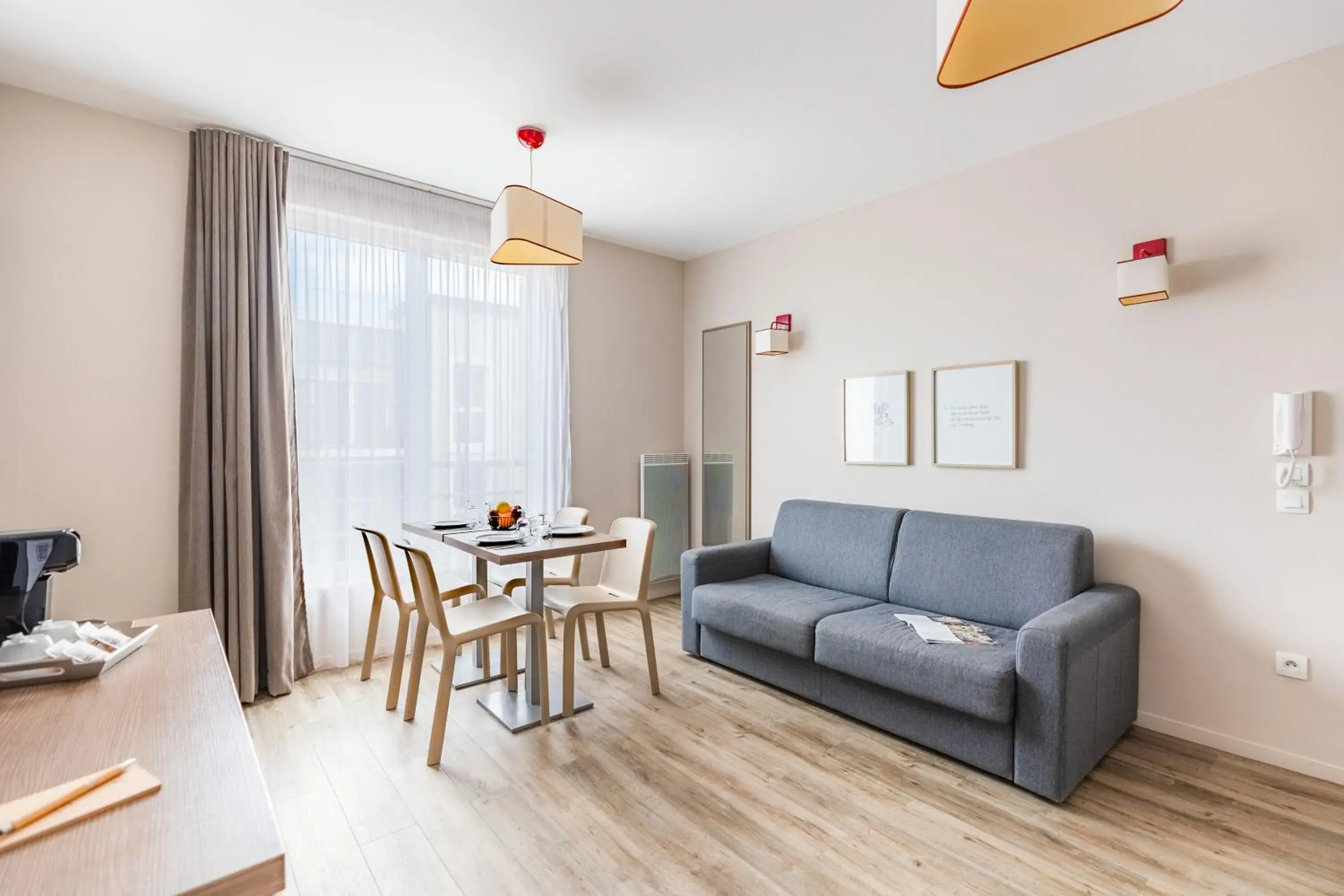 Living room in Appart'City Confort Cherbourg Living room in Appart'City Confort Cherbourg