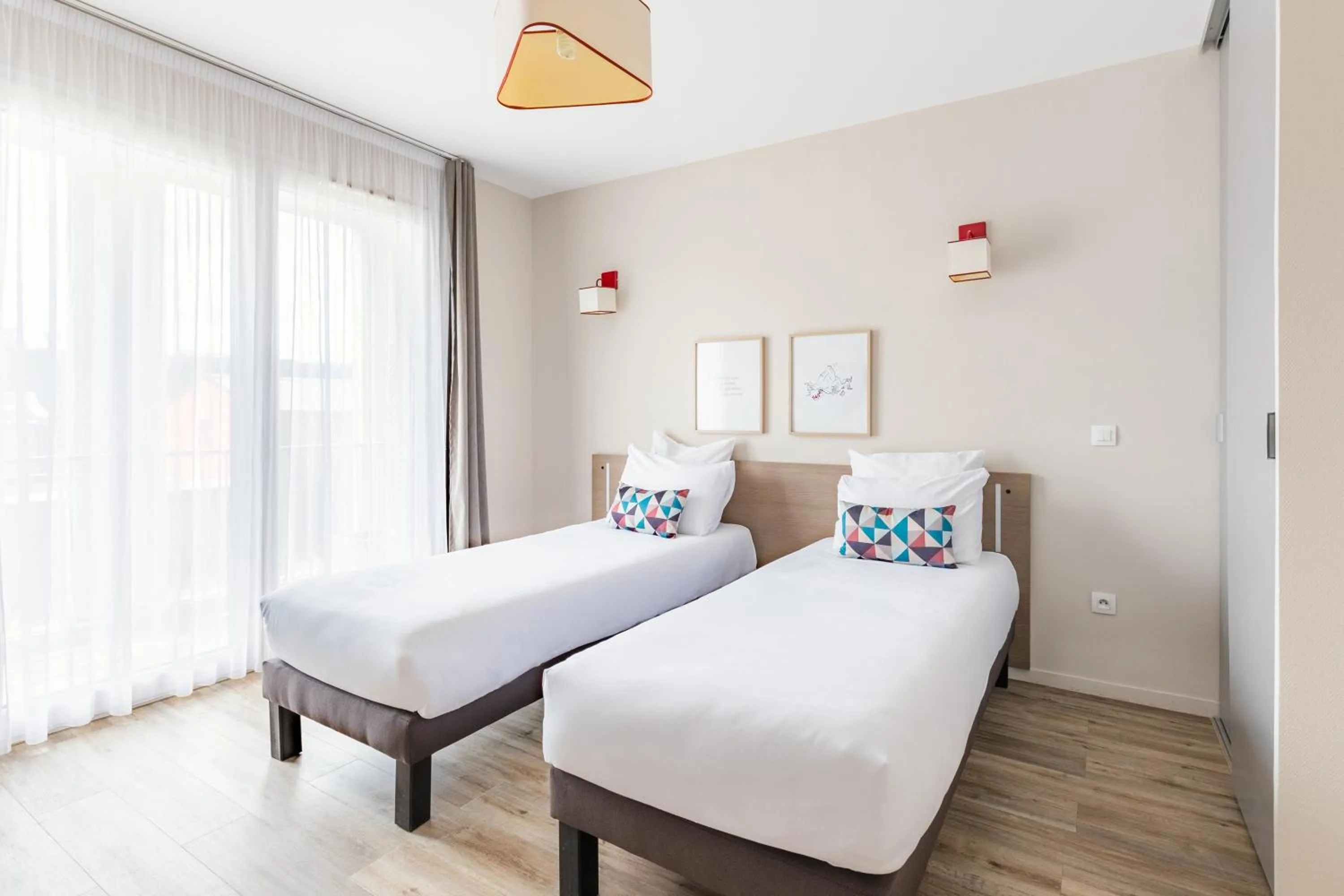 Bed in Appart'City Confort Cherbourg