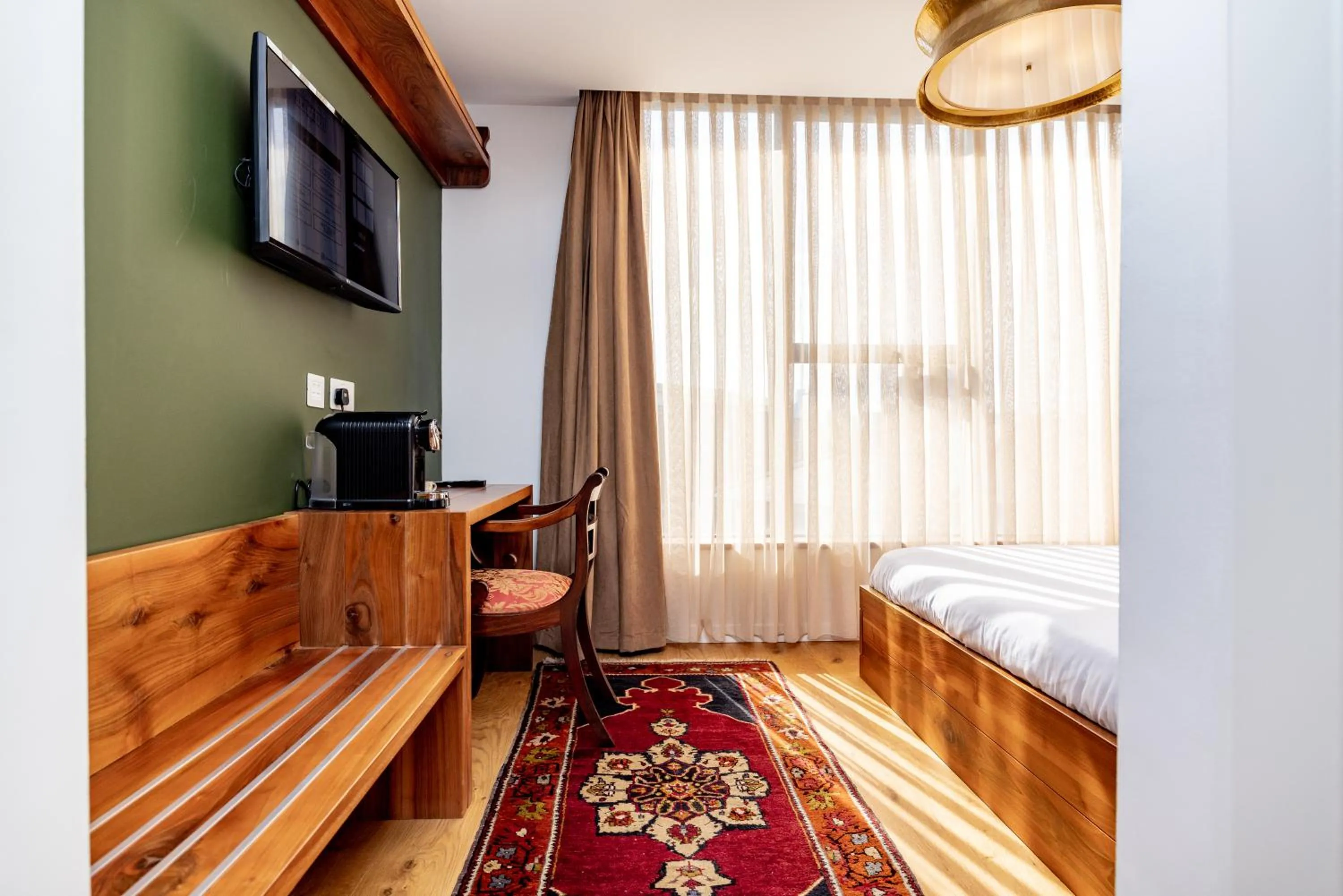 Bed in Limehouse Library Hotel