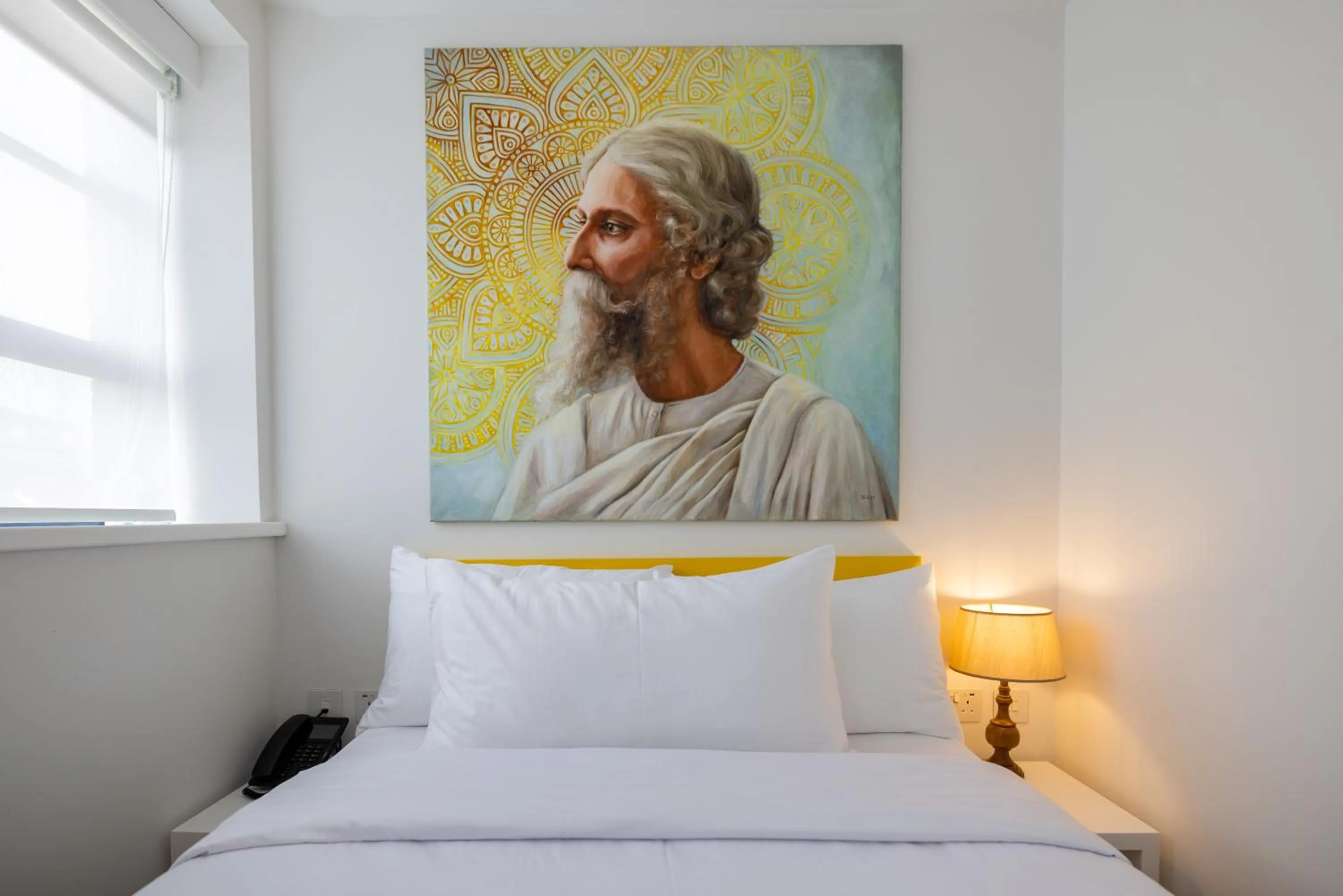 Bed in Limehouse Library Hotel