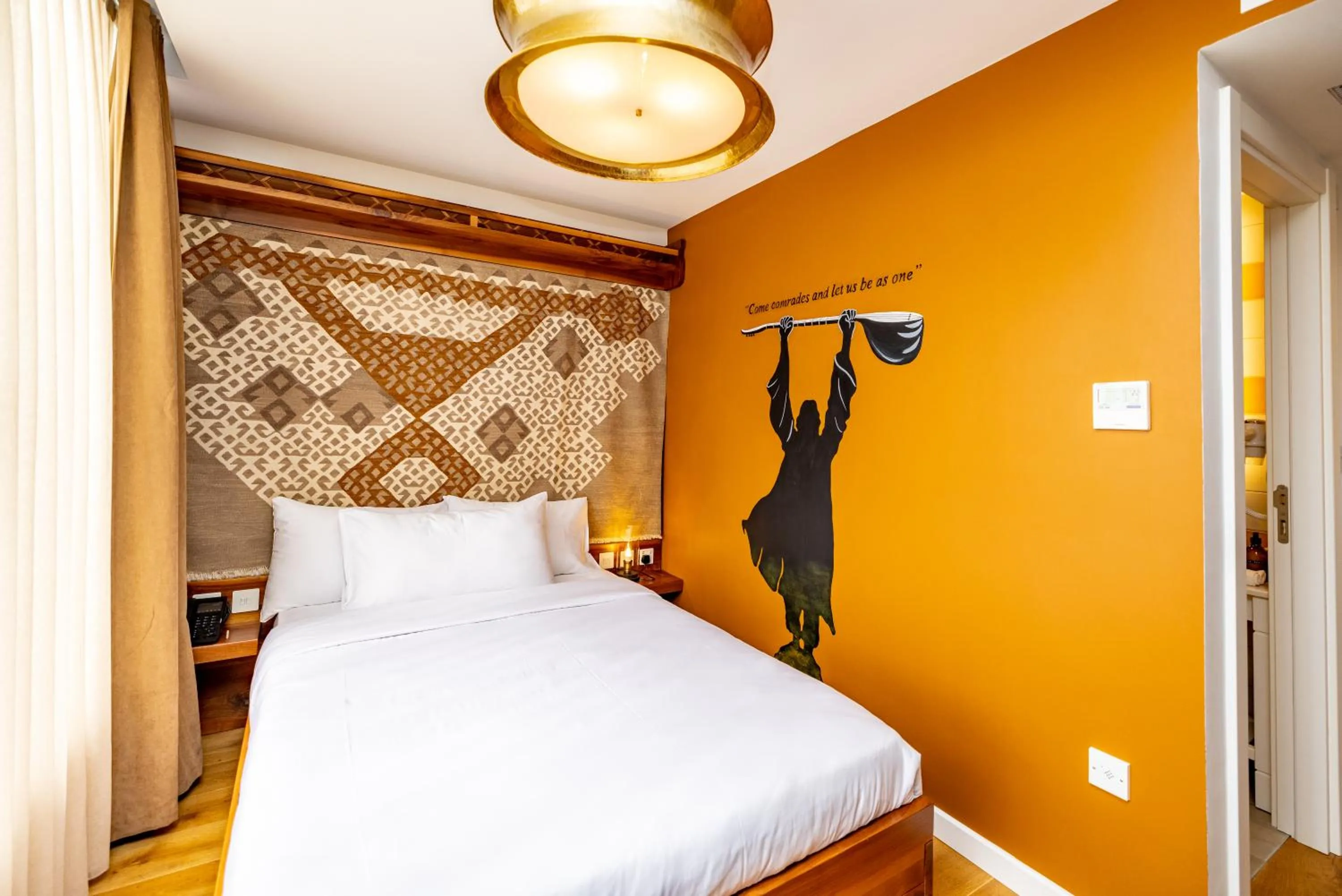 Bed in Limehouse Library Hotel