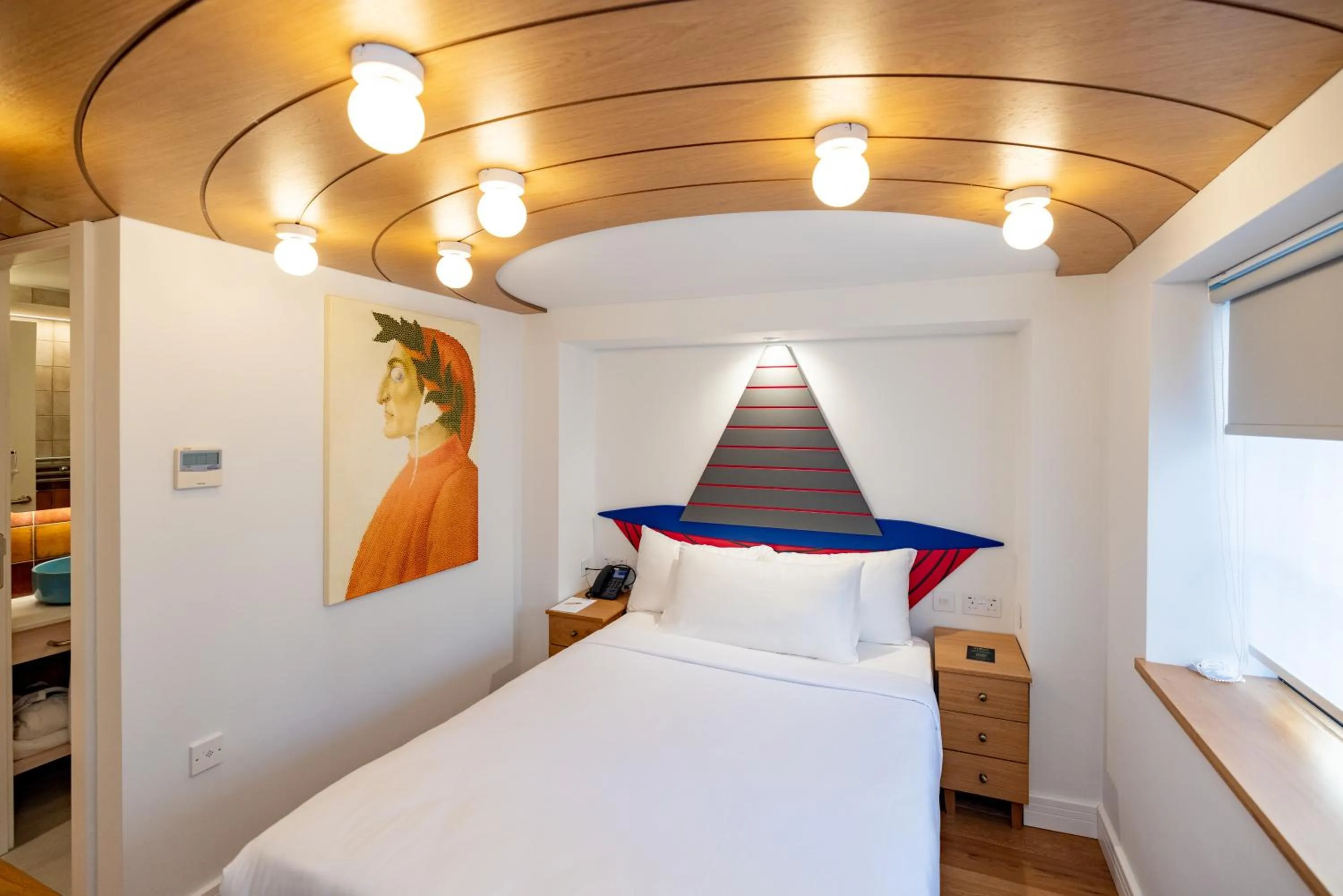 Bed in Limehouse Library Hotel