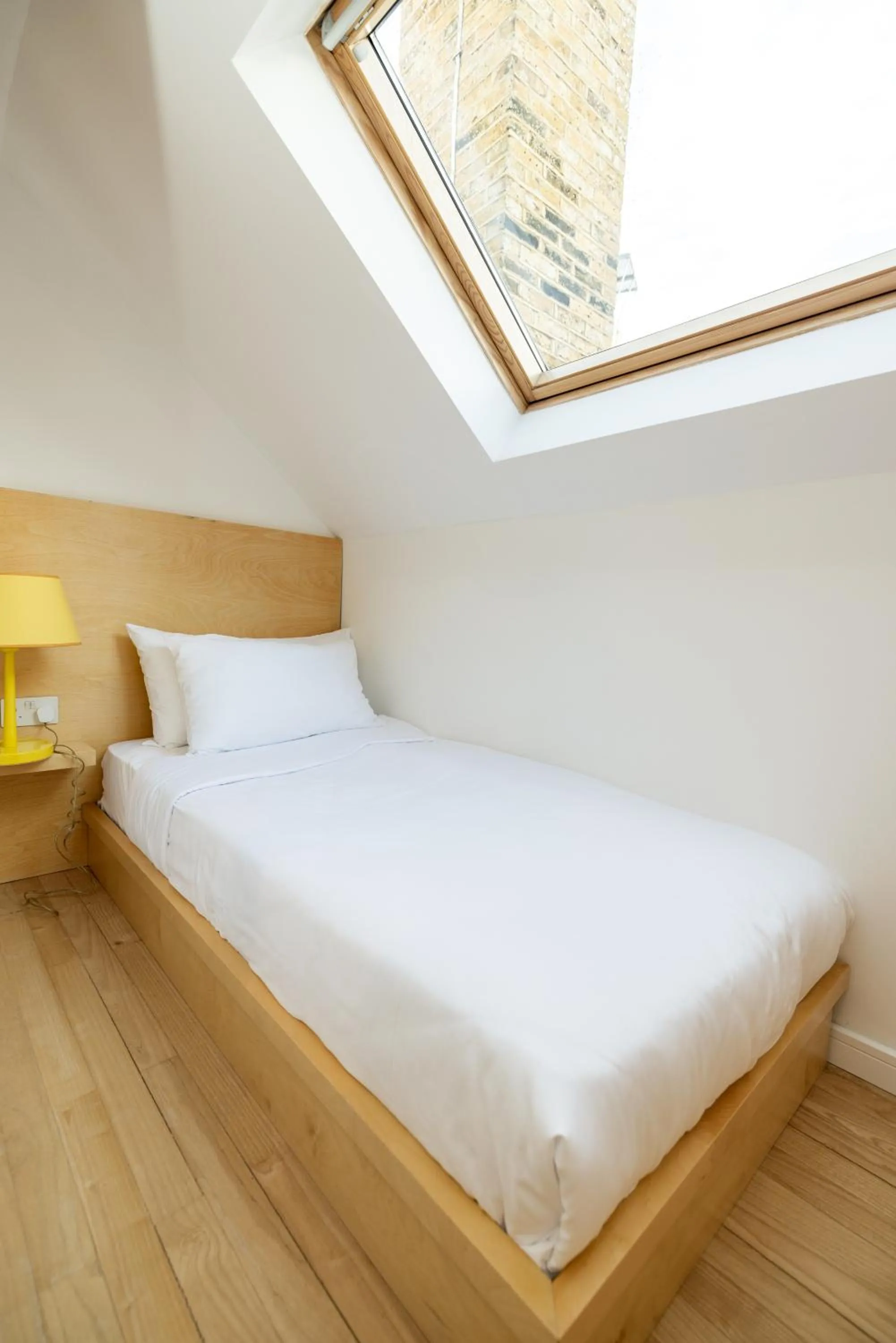 Bed in Limehouse Library Hotel