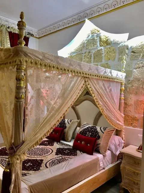 Bed in Suite Orientale Maison de L'église du Couvent