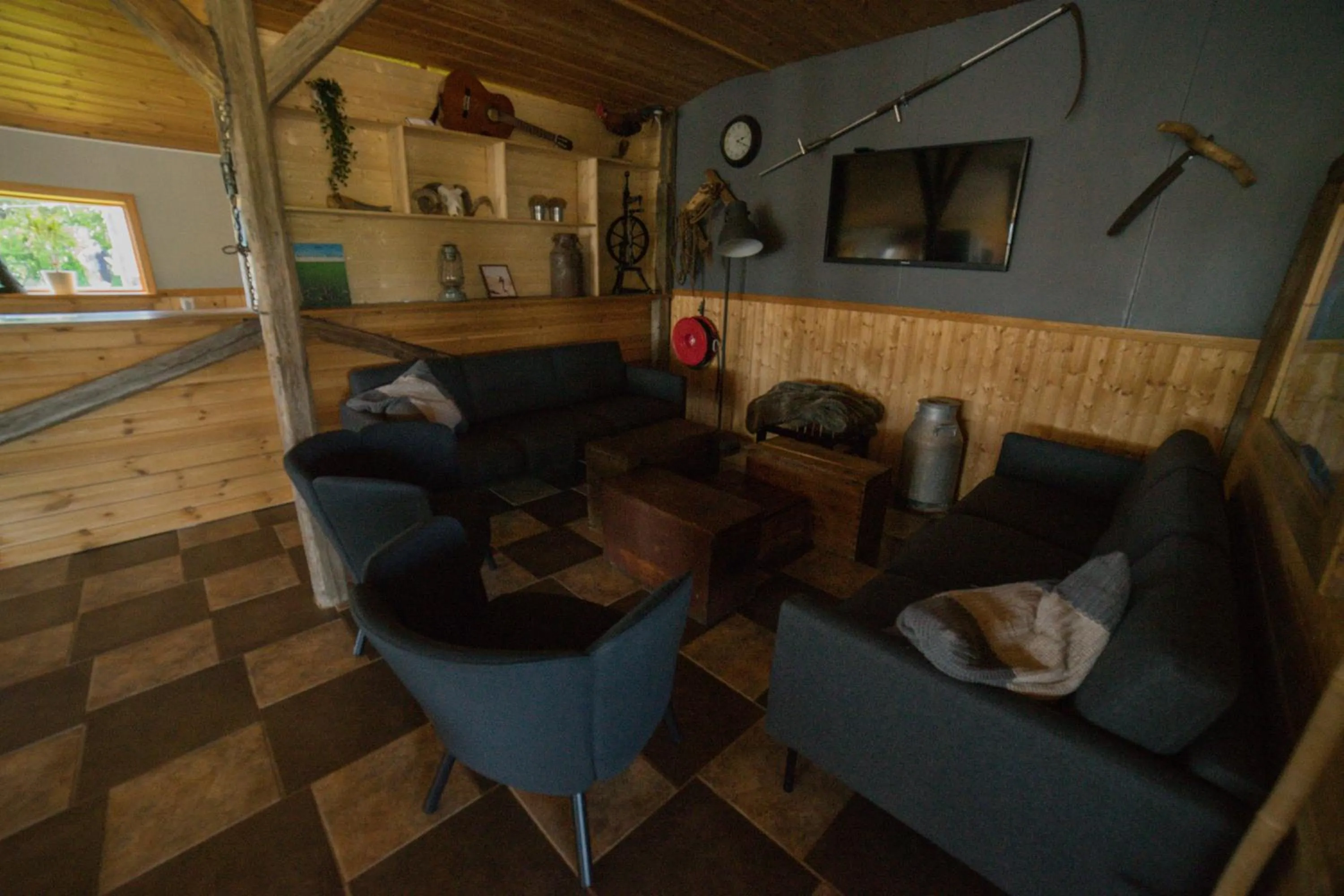 Communal lounge/ TV room in Hótel Á
