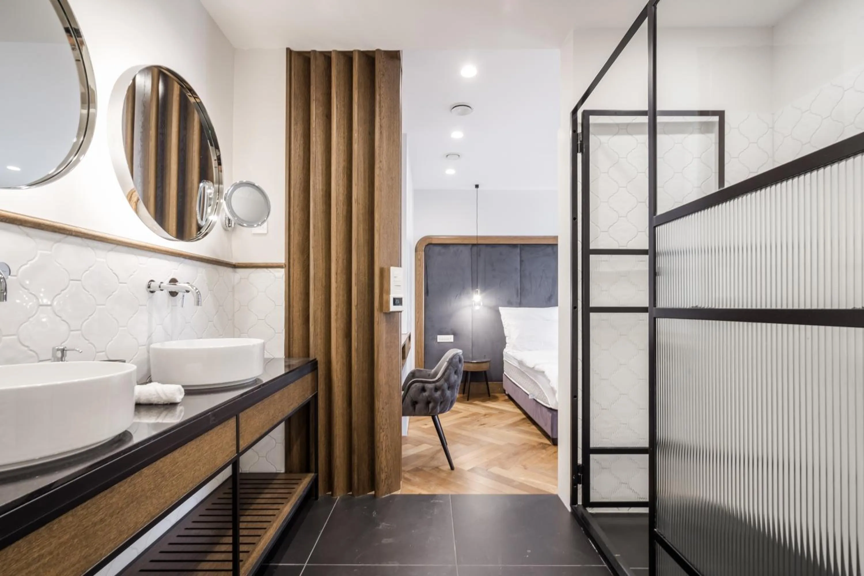 Bathroom, Bed in Budapest Eye- Boutique Suites, by BQA