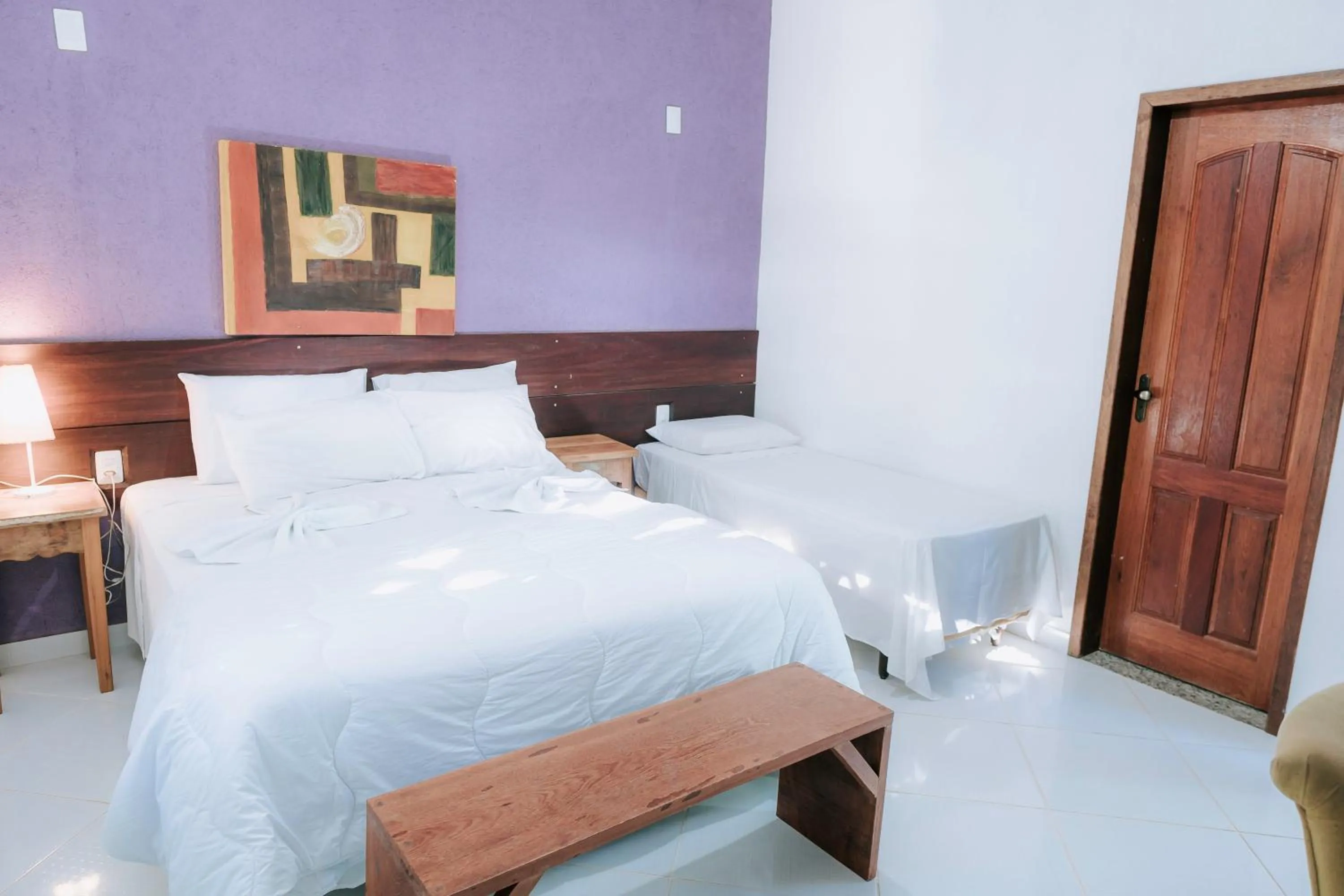 Bed in Pousada Adega Cipo