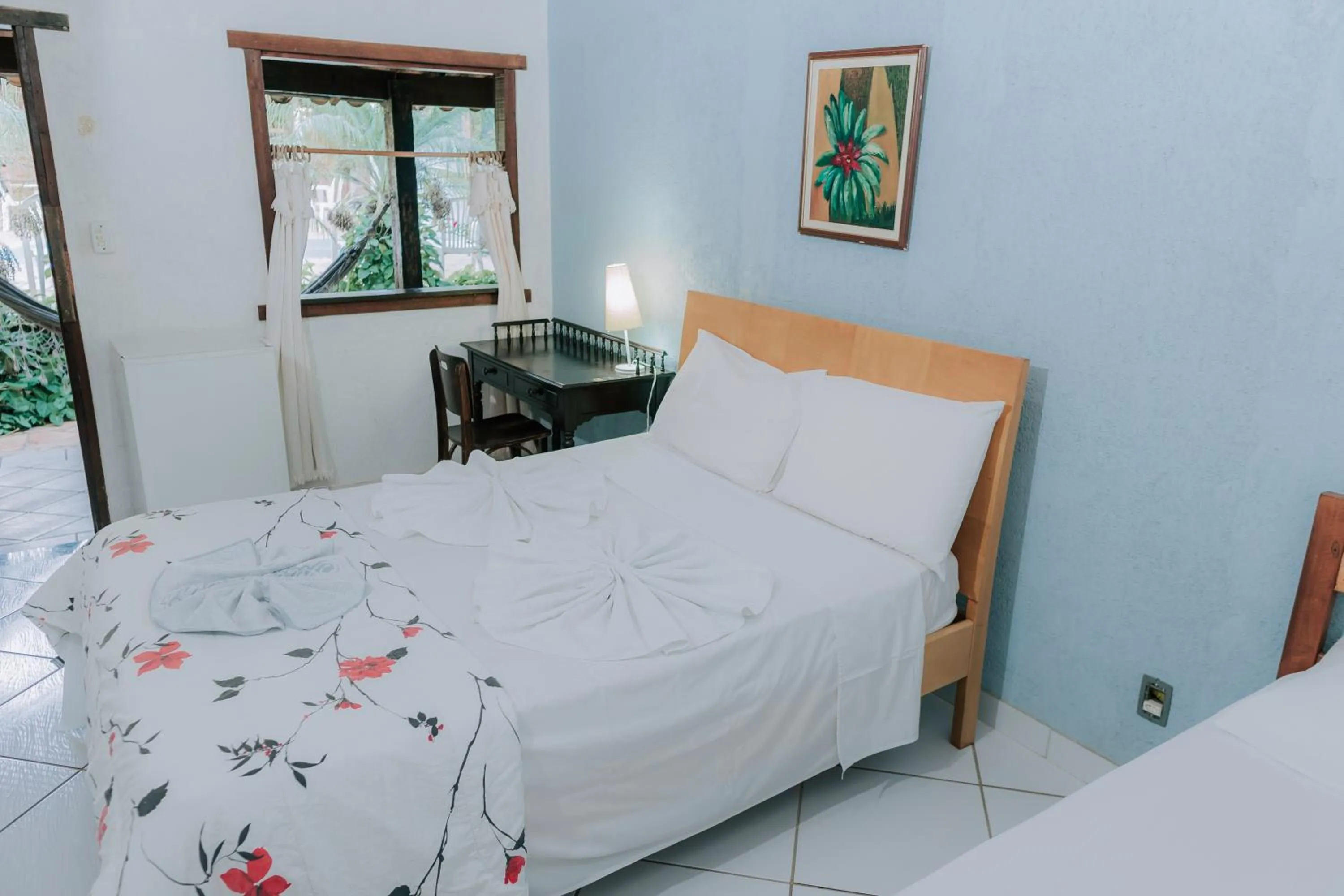 Bed in Pousada Adega Cipo