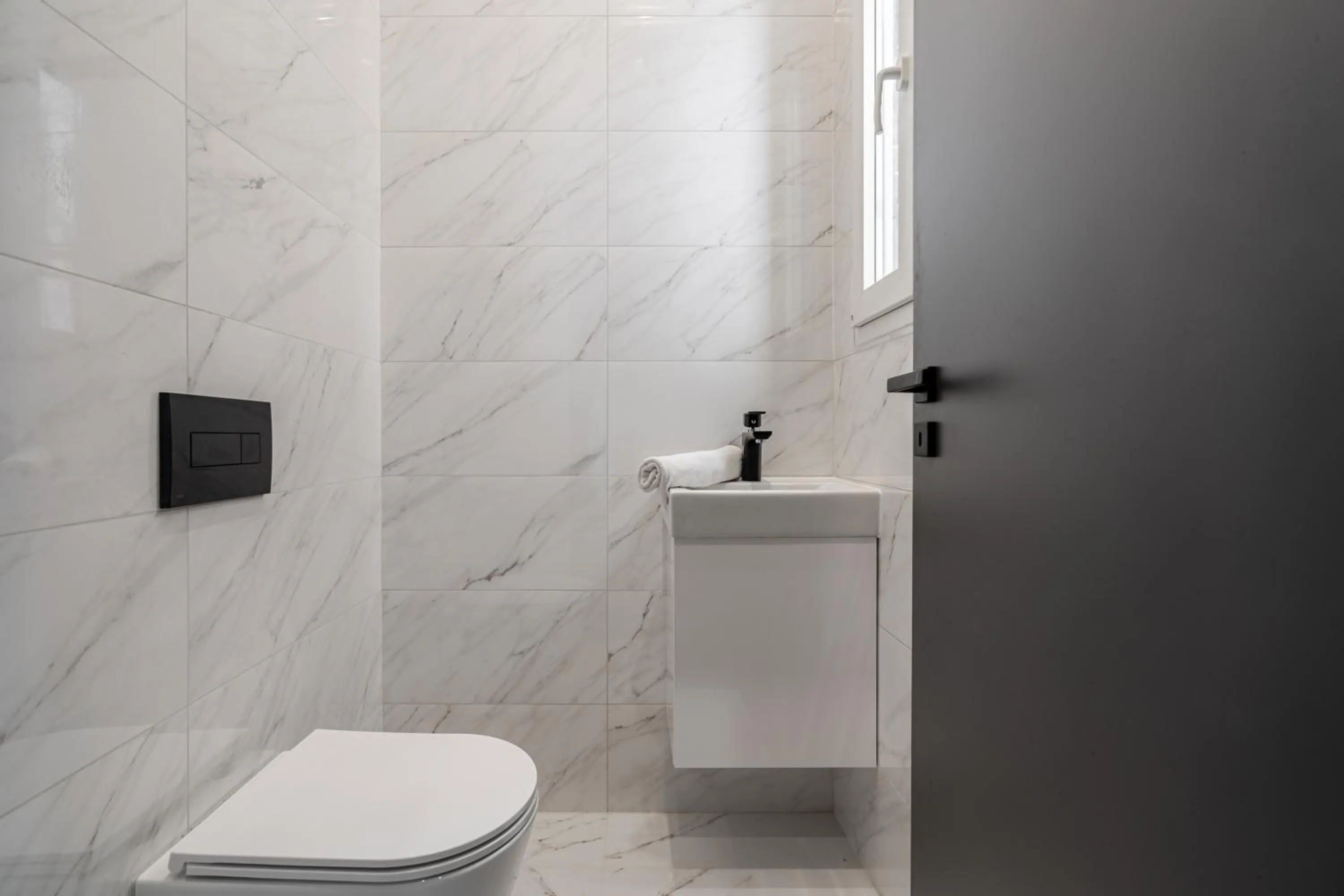 Toilet in Astoria Boutique Suites- Best Location by BQA