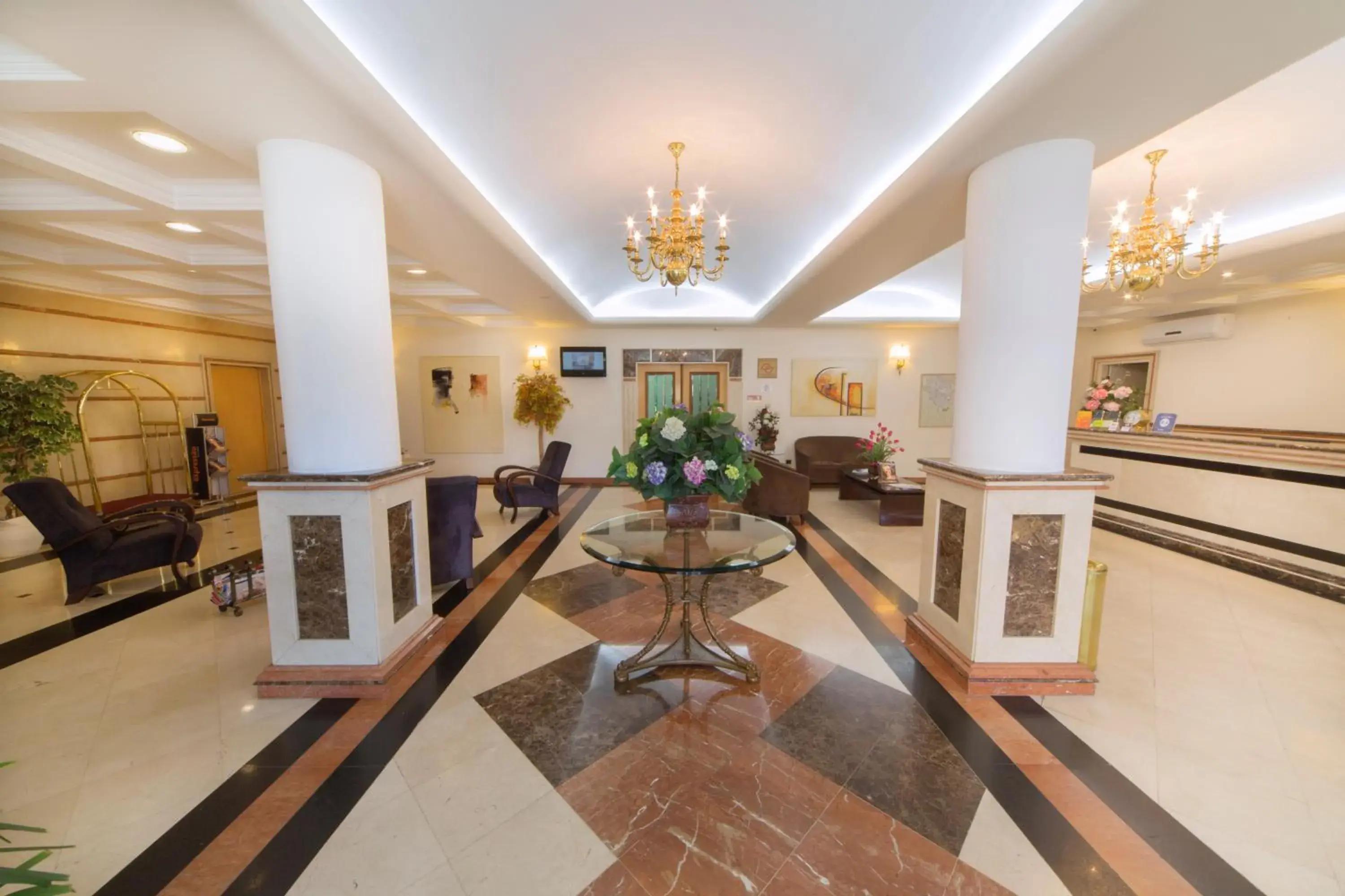 Lobby or reception in Hotel Plaza Mayor Lobby or reception in Hotel Plaza Mayor