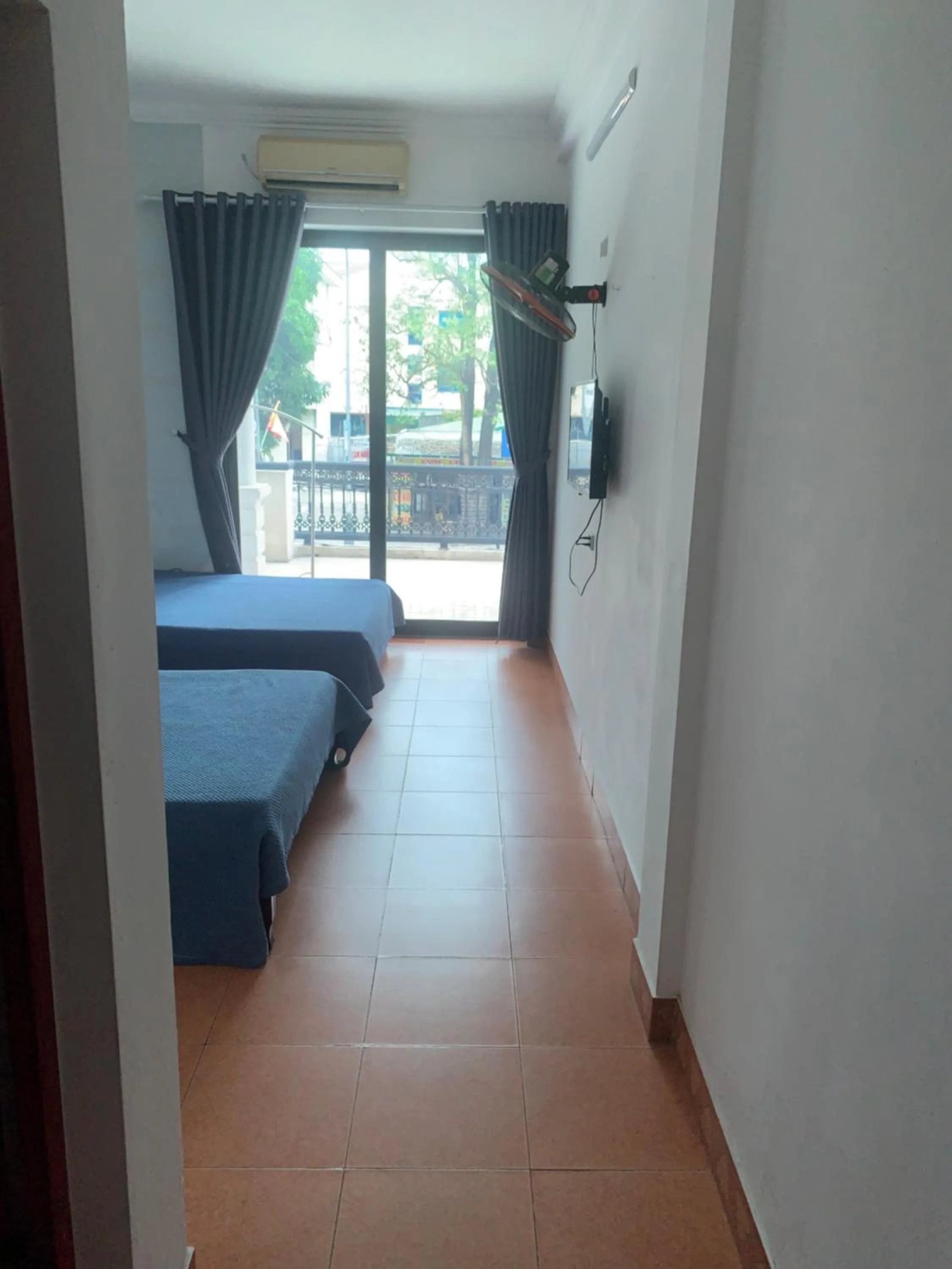 Bed in Khách Sạn Tuấn Thảo Cửa Lò