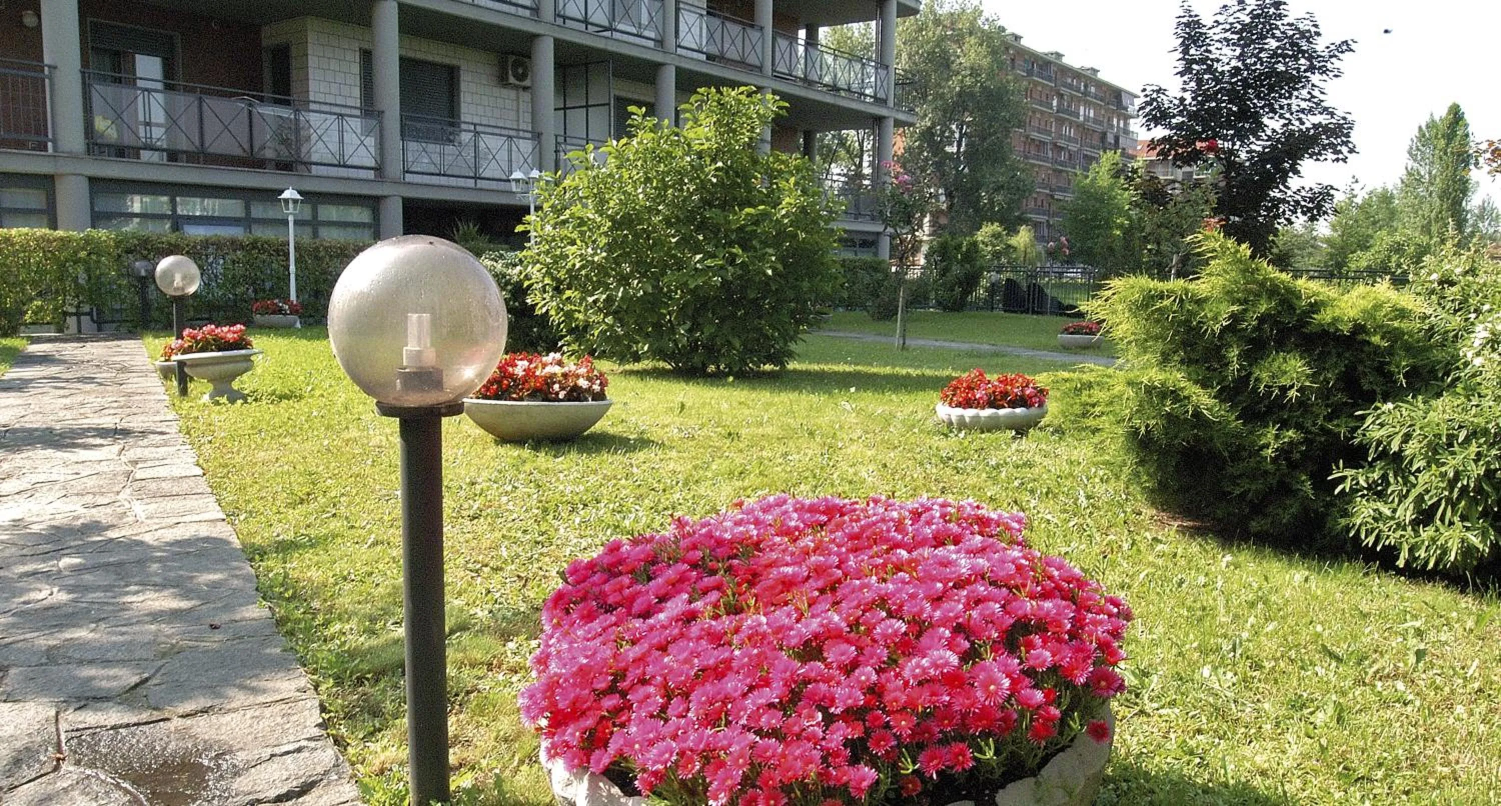 Garden in Hotel Residenza Delle Alpi