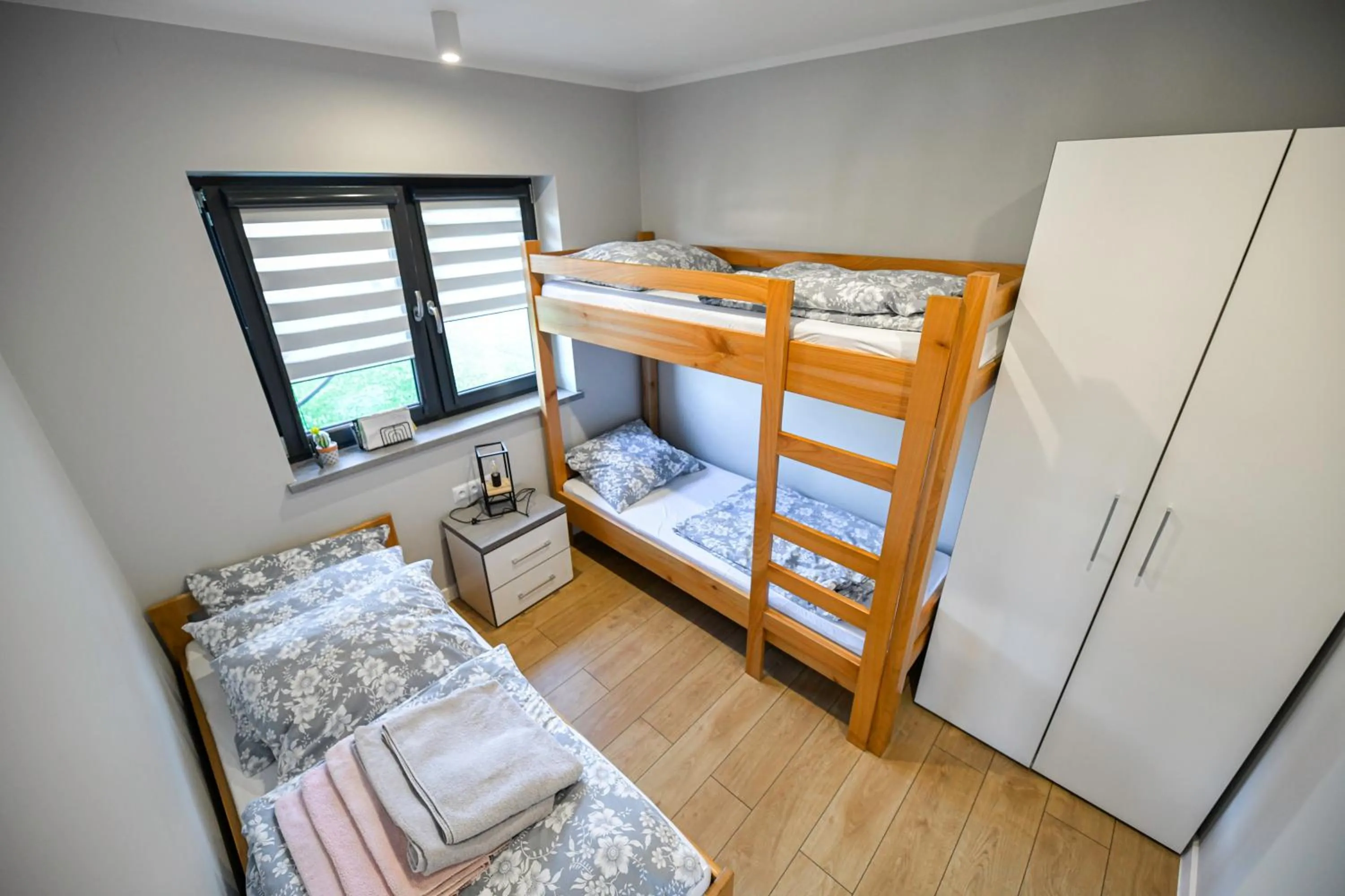 Bed in Domki Pod Skarpą Zator