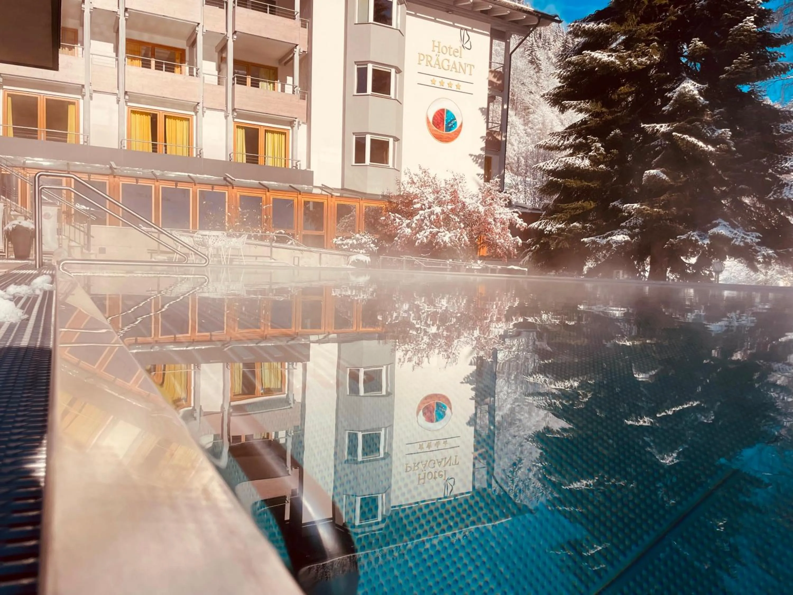 Pool view in Evident Hotel Prägant 4-Superior