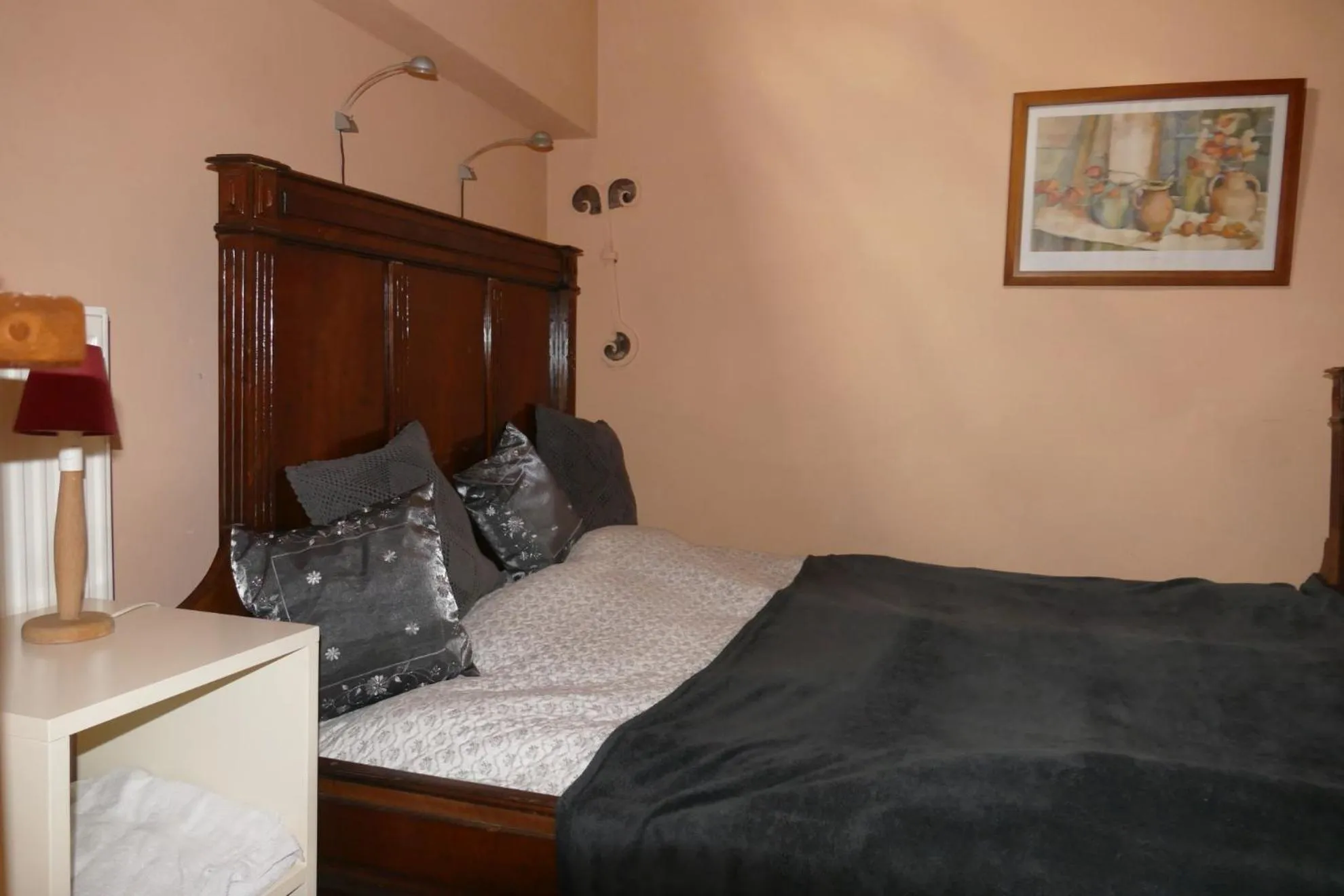 Bed in Apartments Cour d'Aix