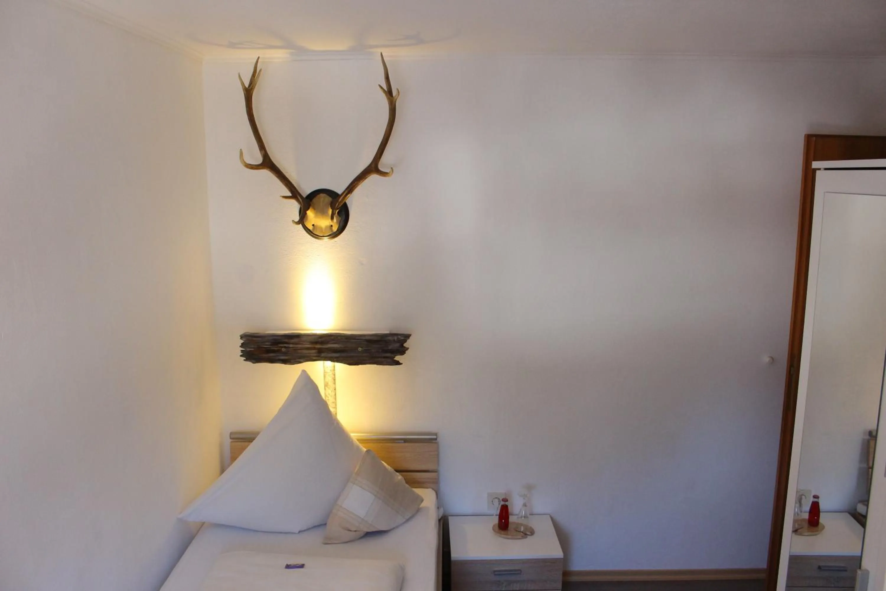 Decorative detail, Bed in Gästehaus Stöckl