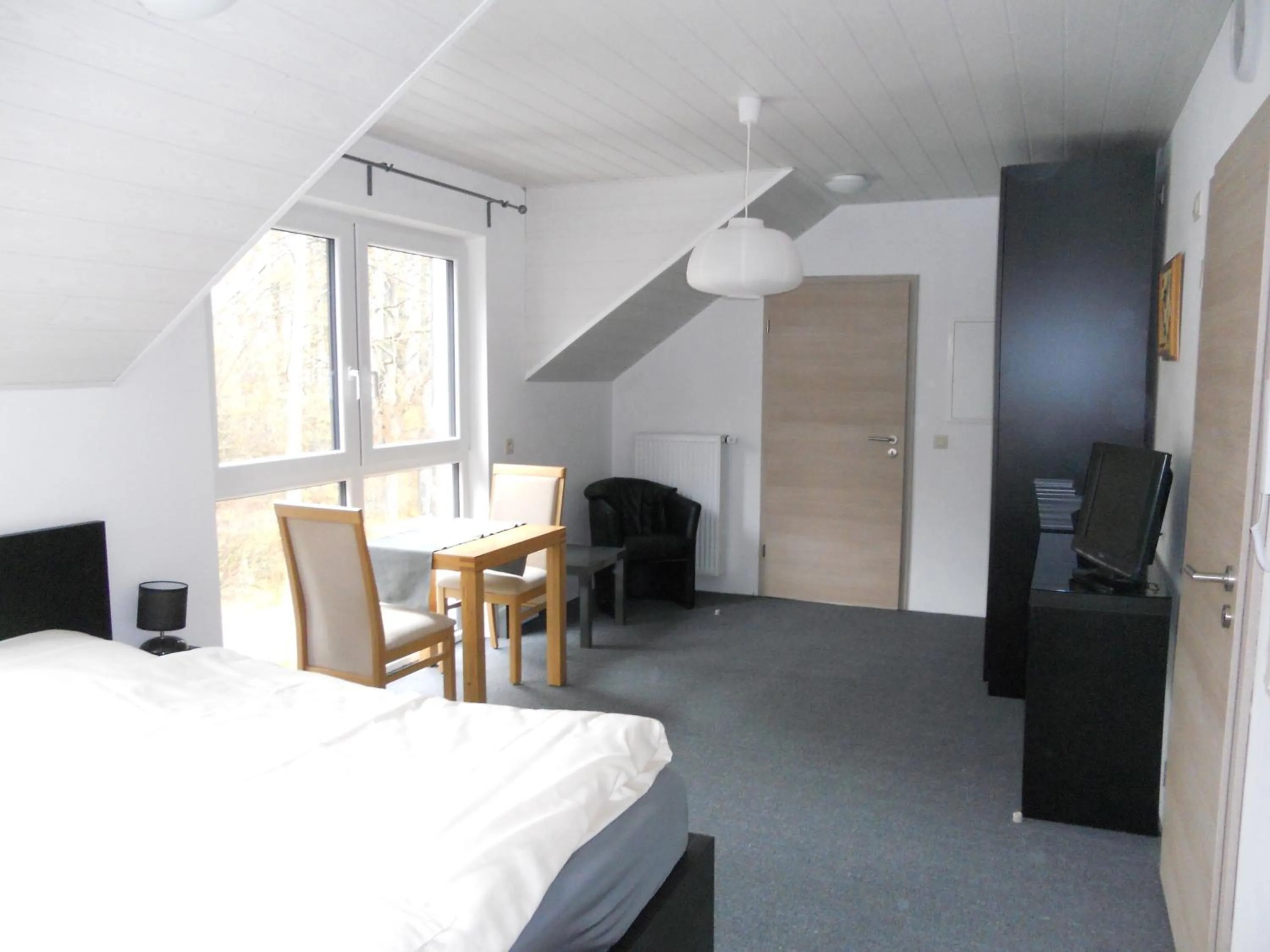 Photo of the whole room, Bed in B&B V.K. PGmbH