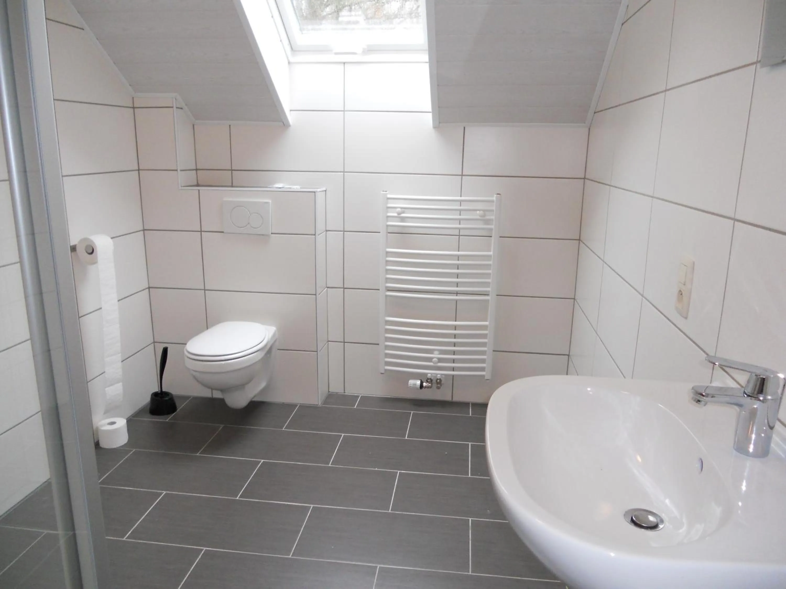 Bathroom in B&B V.K. PGmbH