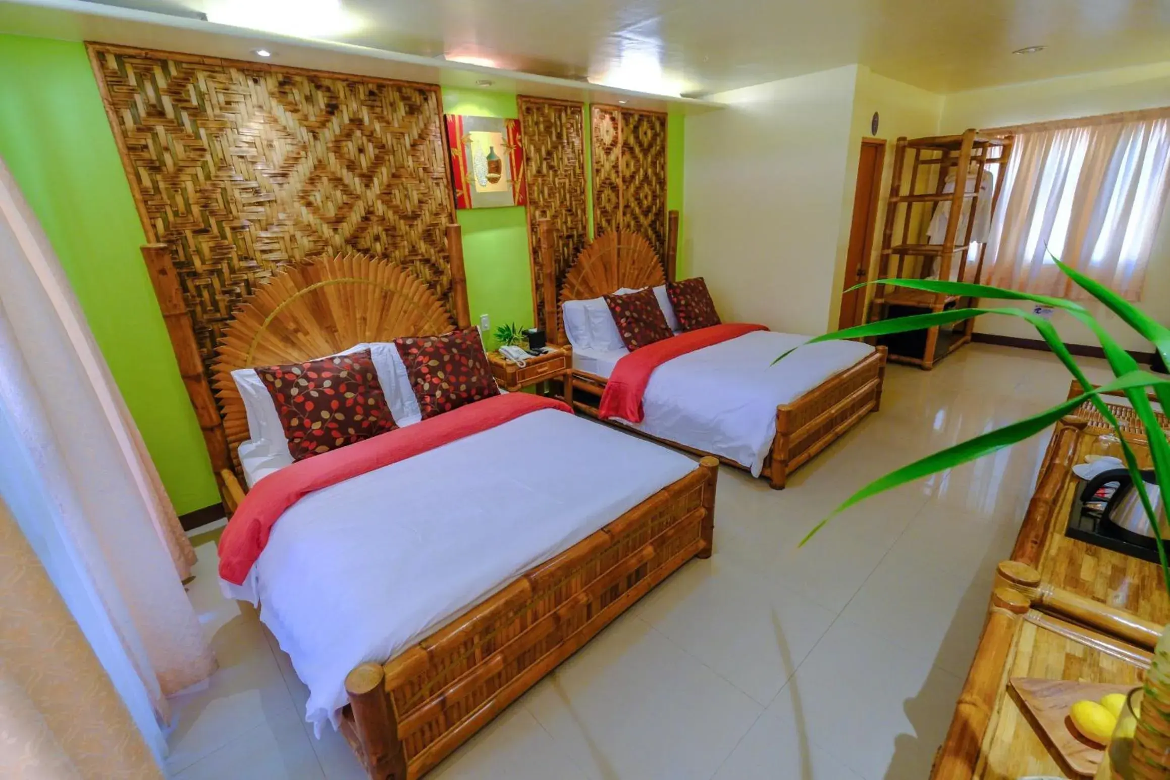 Bed in Malapascua Exotic Island Dive Resort Bed in Malapascua Exotic Island Dive Resort