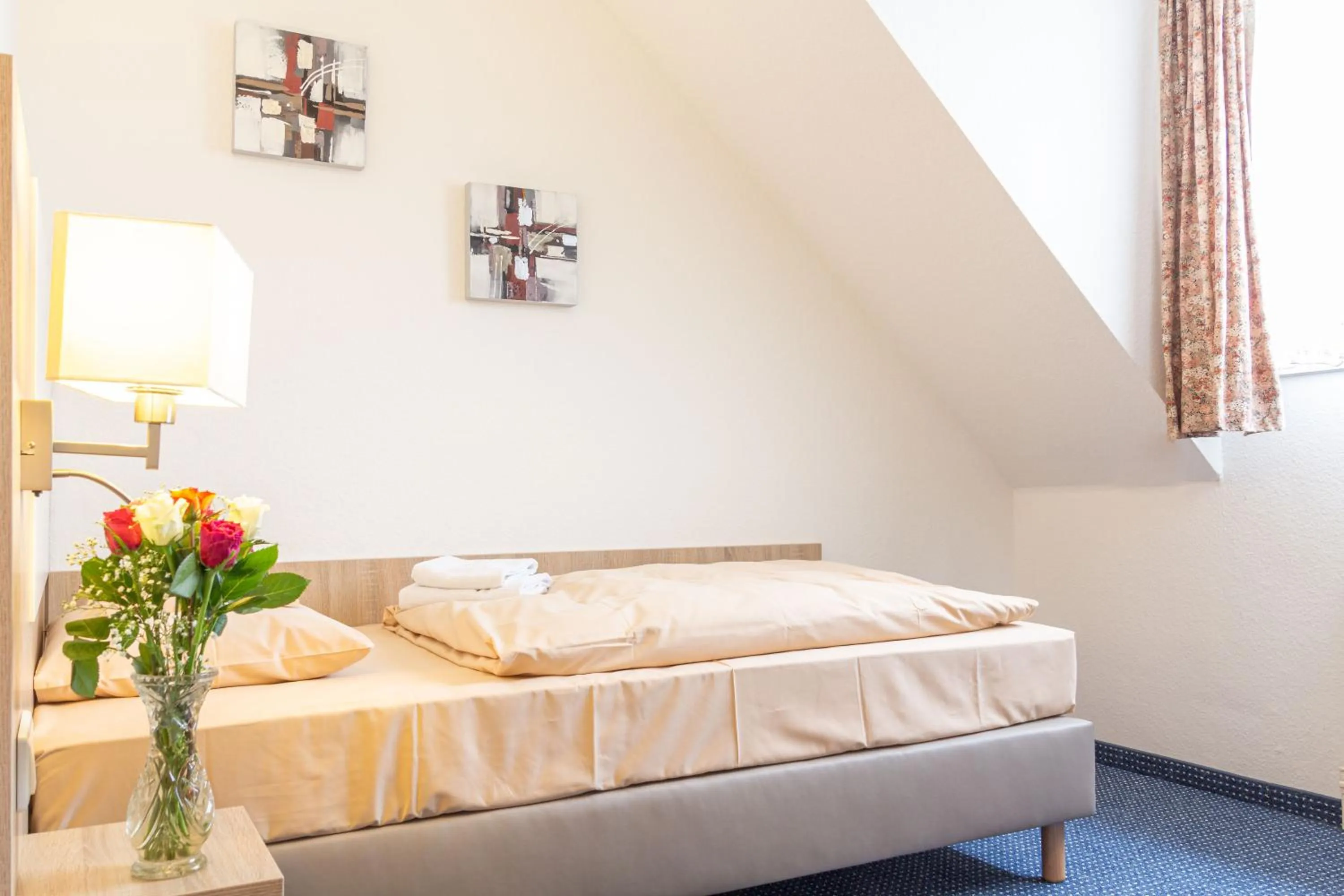 Photo of the whole room, Bed in Hotel Kelkheimer Hof