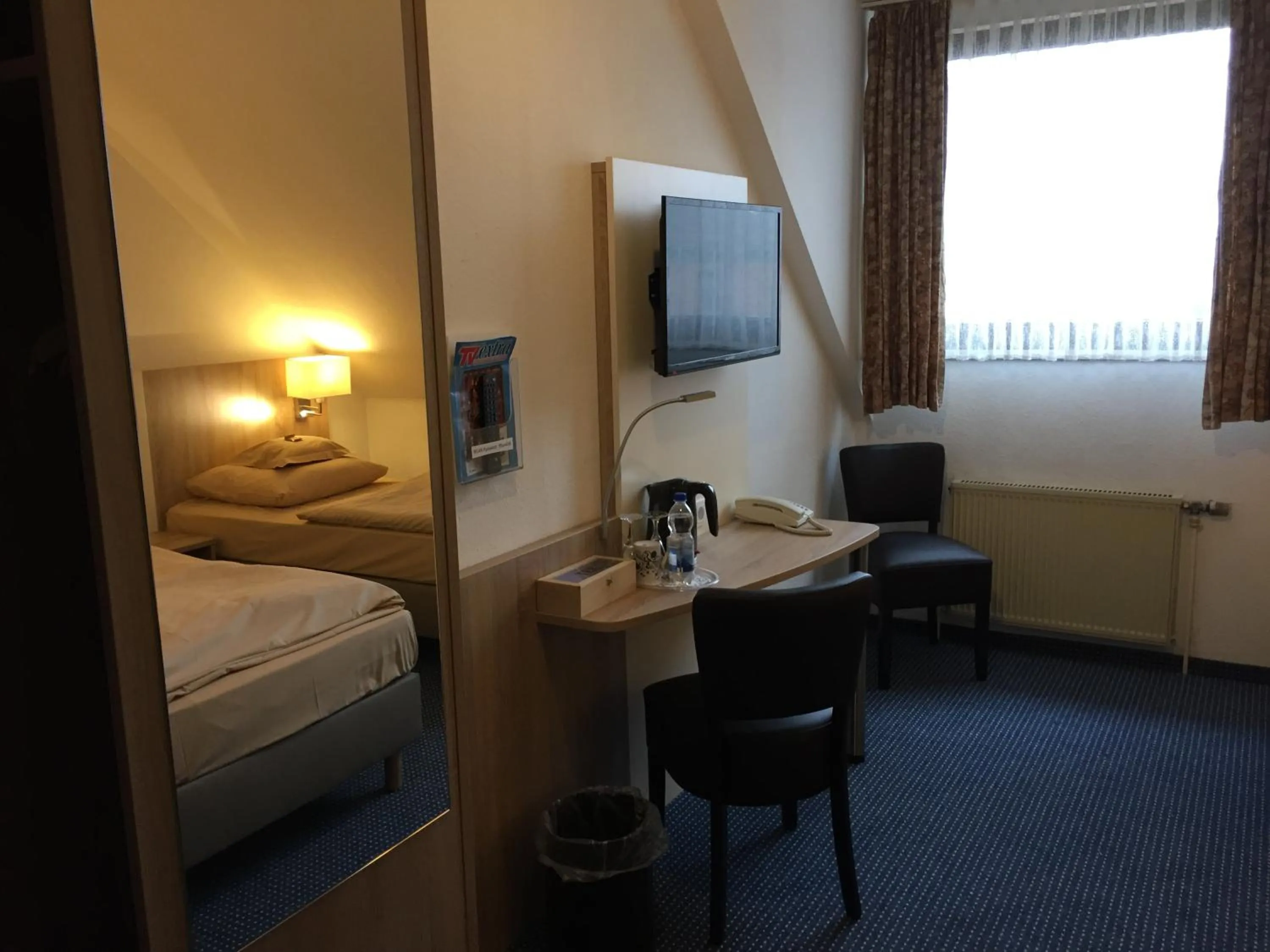 Photo of the whole room, Bed in Hotel Kelkheimer Hof