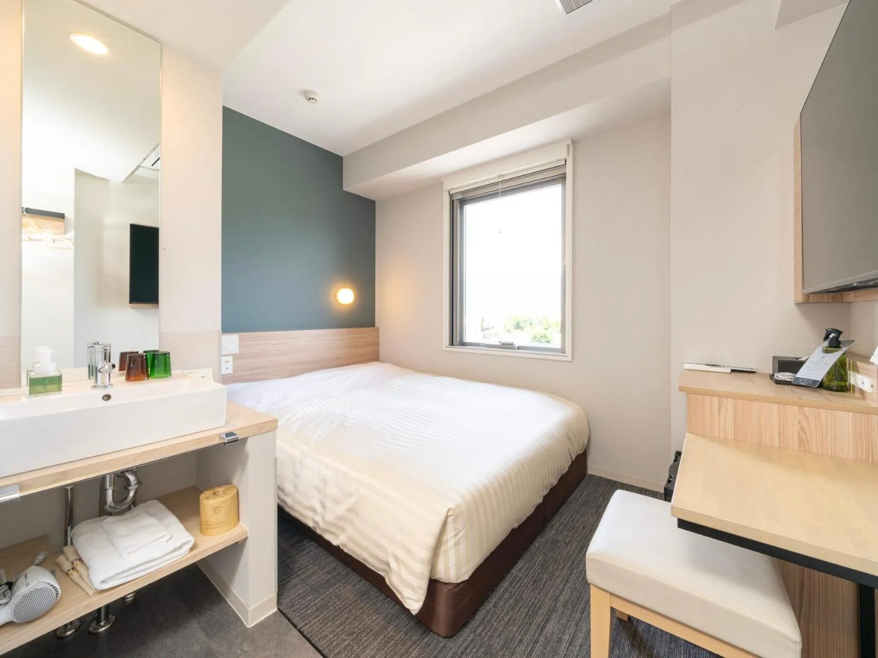 Bed in Super Hotel Fujikawaguchiko Tennenonsen