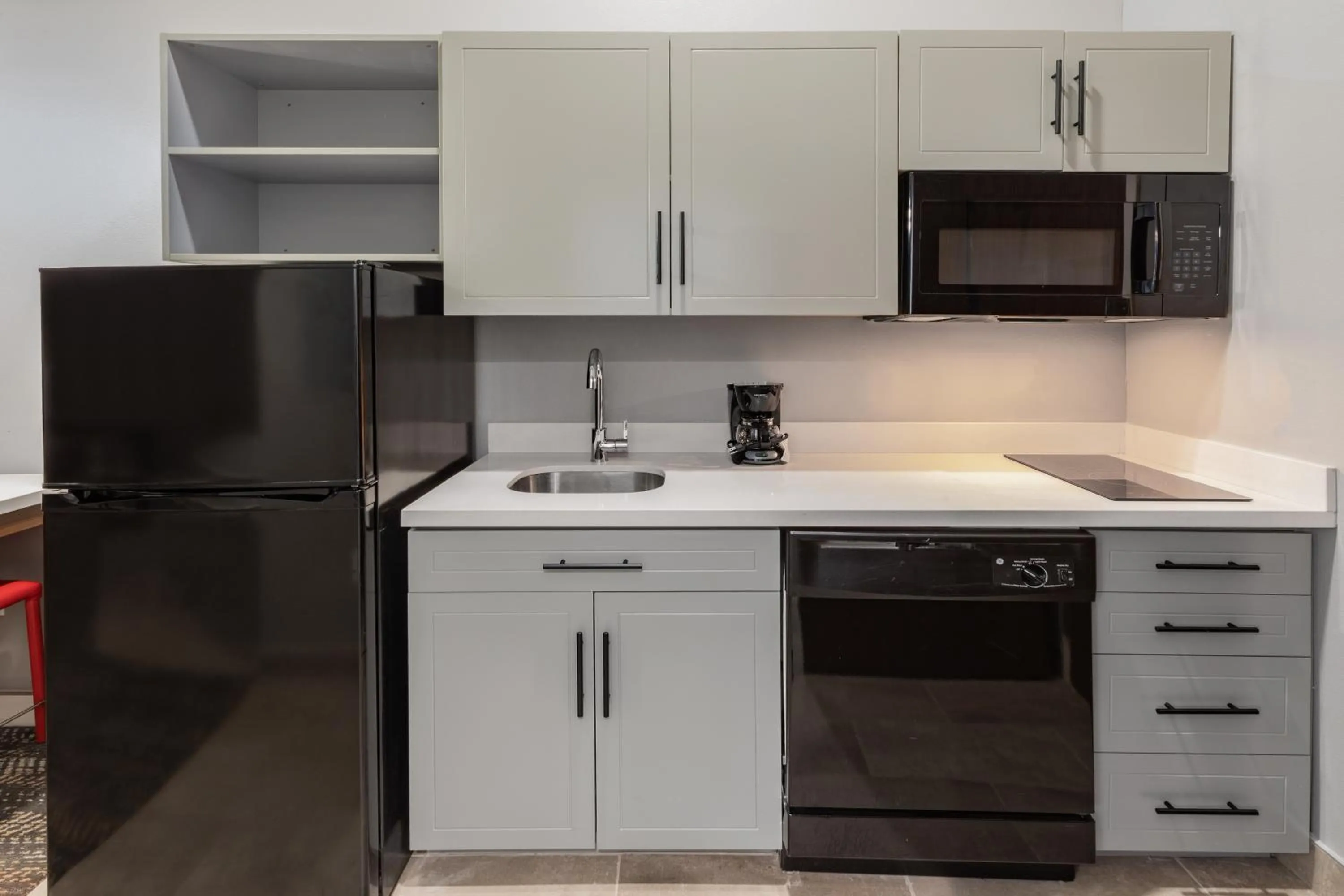 Kitchen or kitchenette in Hawthorn Extended Stay by Wyndham Oklahoma City Airport