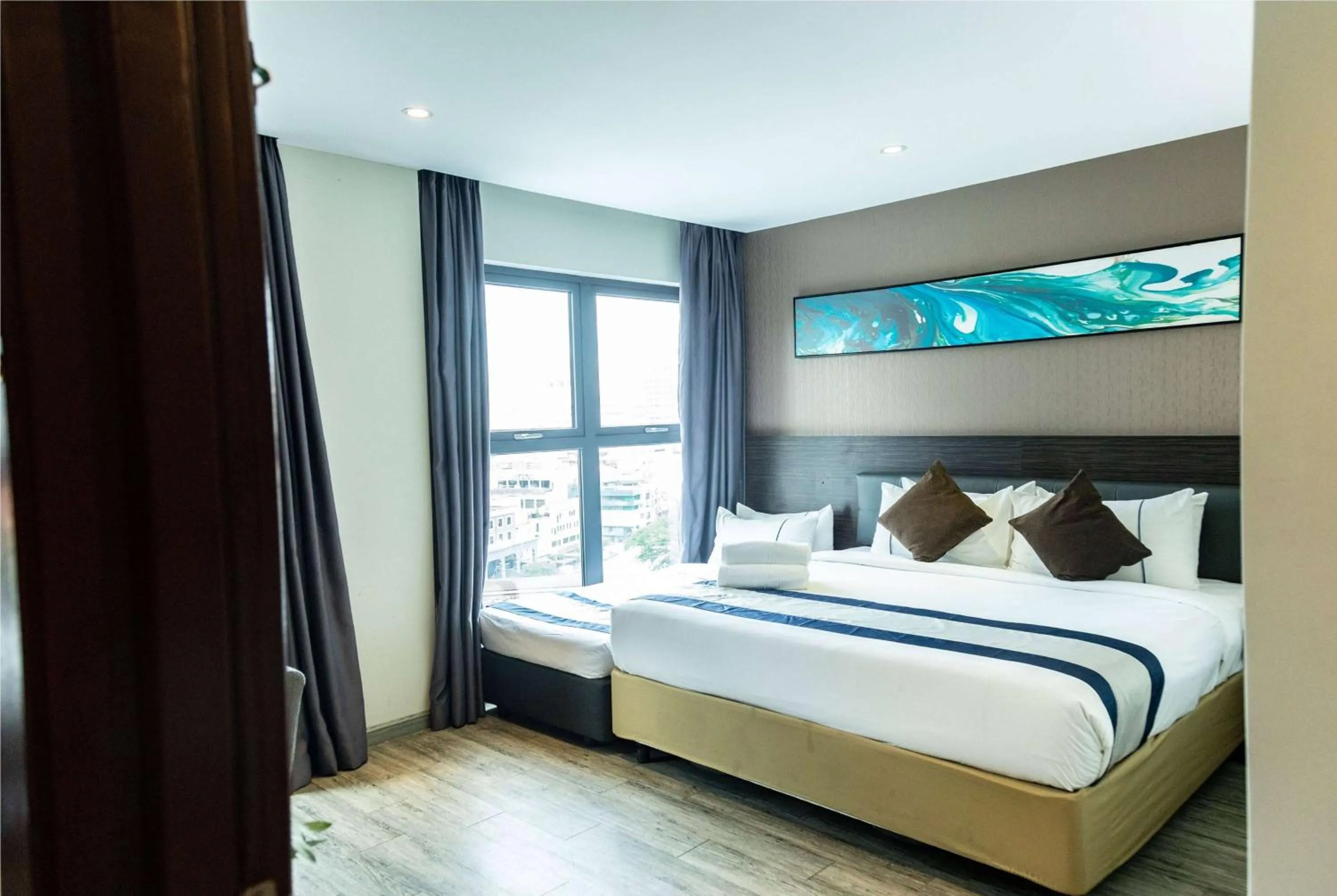 Photo of the whole room, Bed in Ramada Encore by Wyndham Chinatown Kuala Lumpur