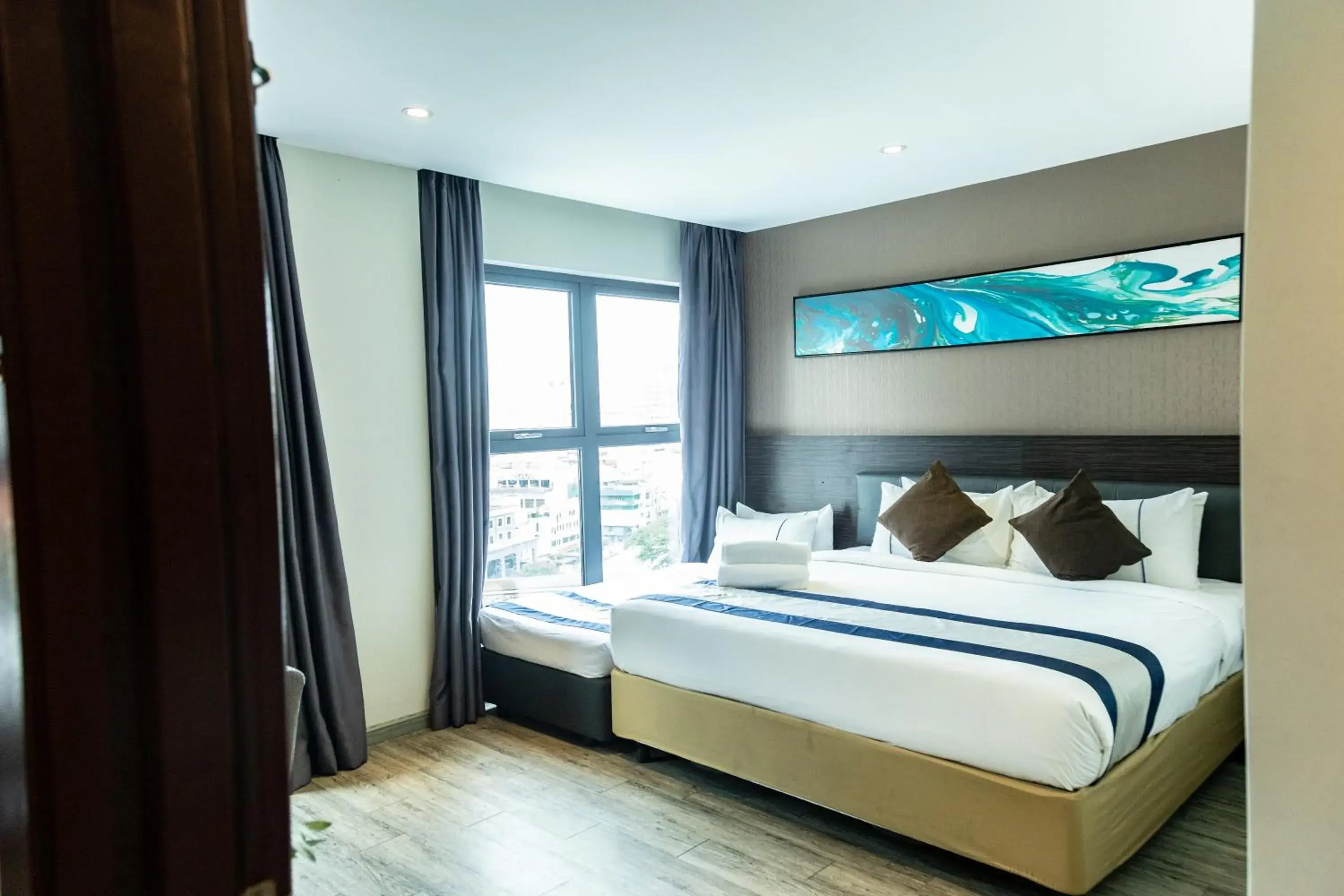 Photo of the whole room, Bed in Ramada Encore by Wyndham Chinatown Kuala Lumpur Photo of the whole room, Bed in Ramada Encore by Wyndham Chinatown Kuala Lumpur