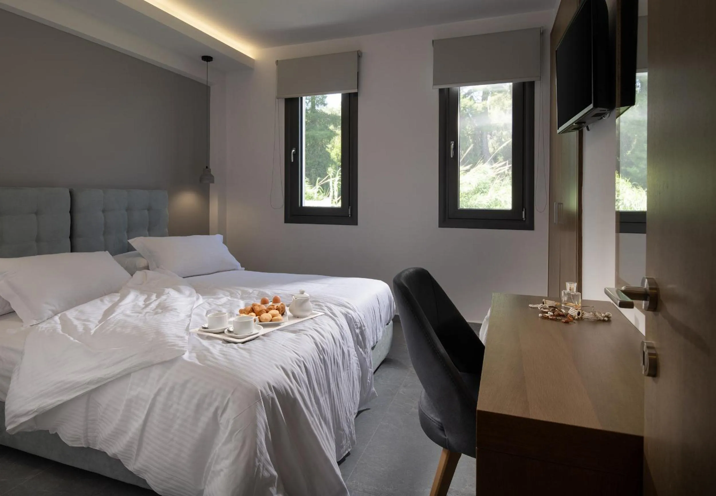 Bed in Terra Olivia Luxury Villas and Suites