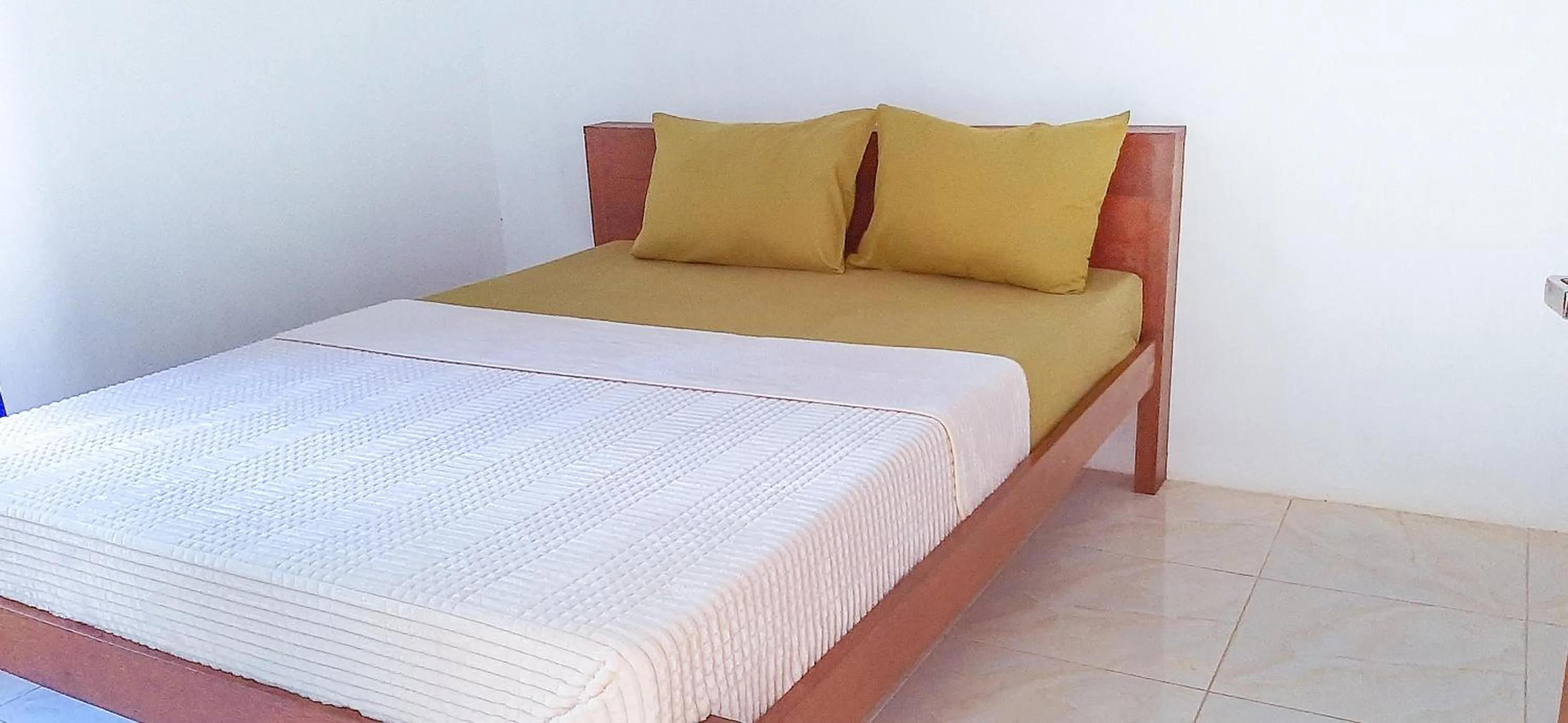 Bed in Villa Kebun Jeruk Syariah Malang by ecommerceloka