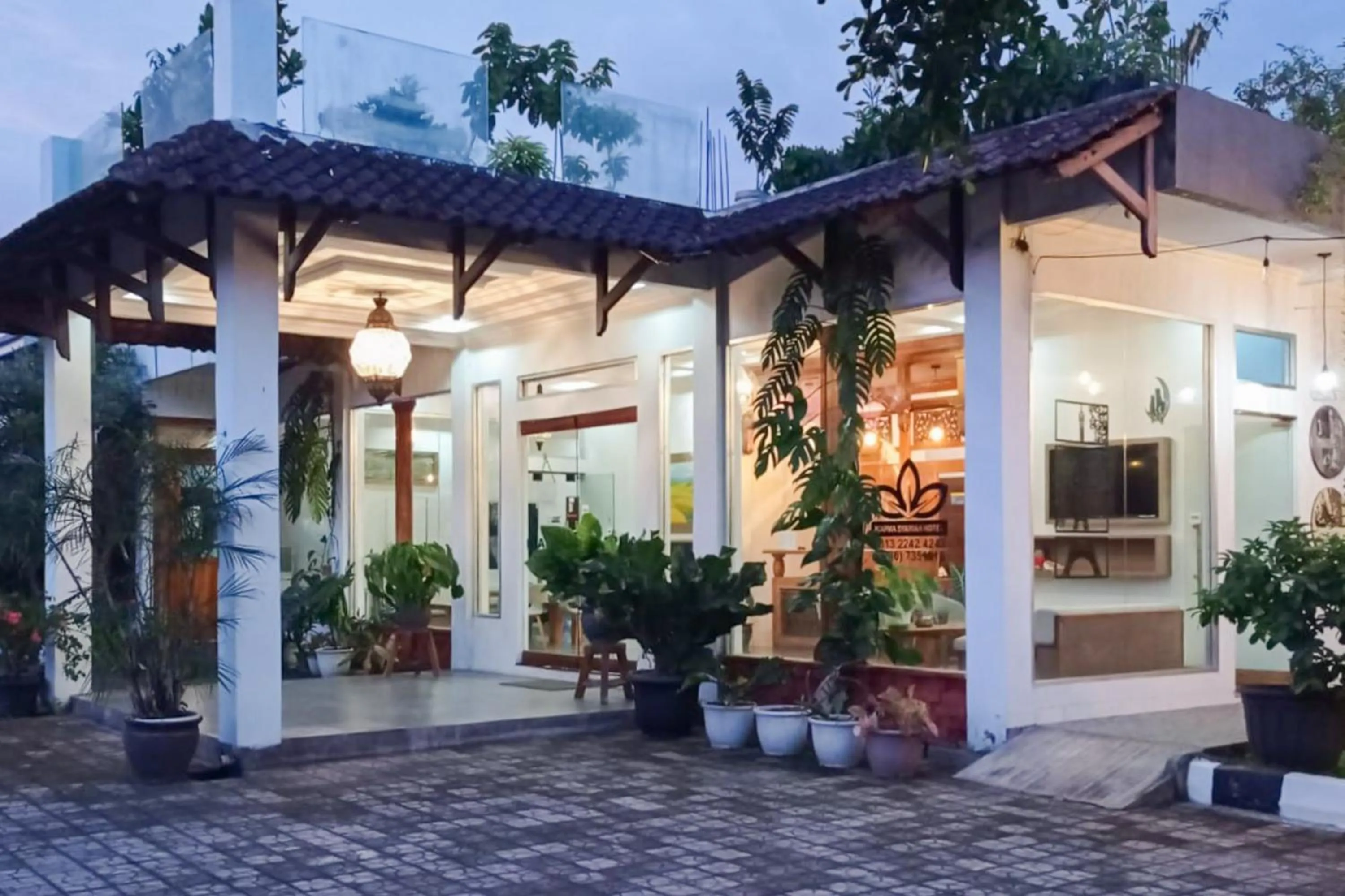 Property building in RedDoorz Syariah at Kiapma Hotel