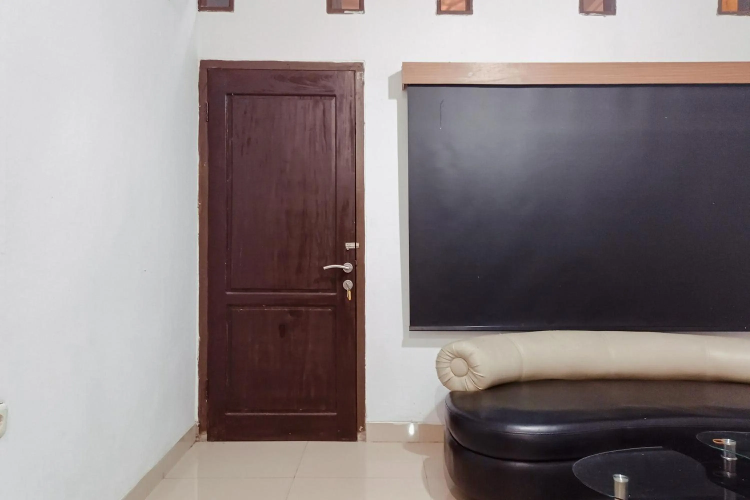 Bedroom in RedDoorz Syariah at Kiapma Hotel