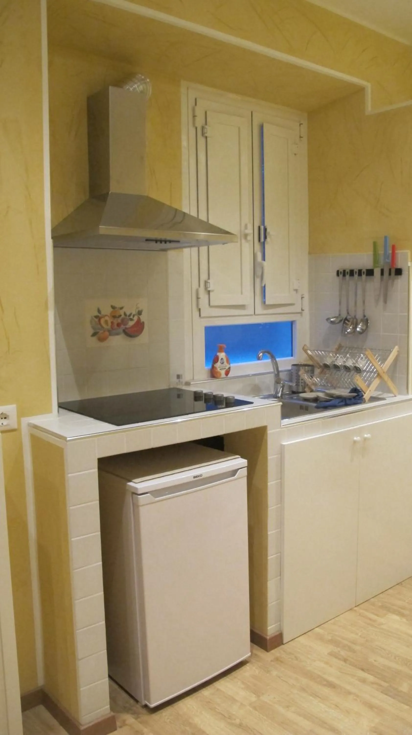 Kitchen or kitchenette in B&B In Piazza