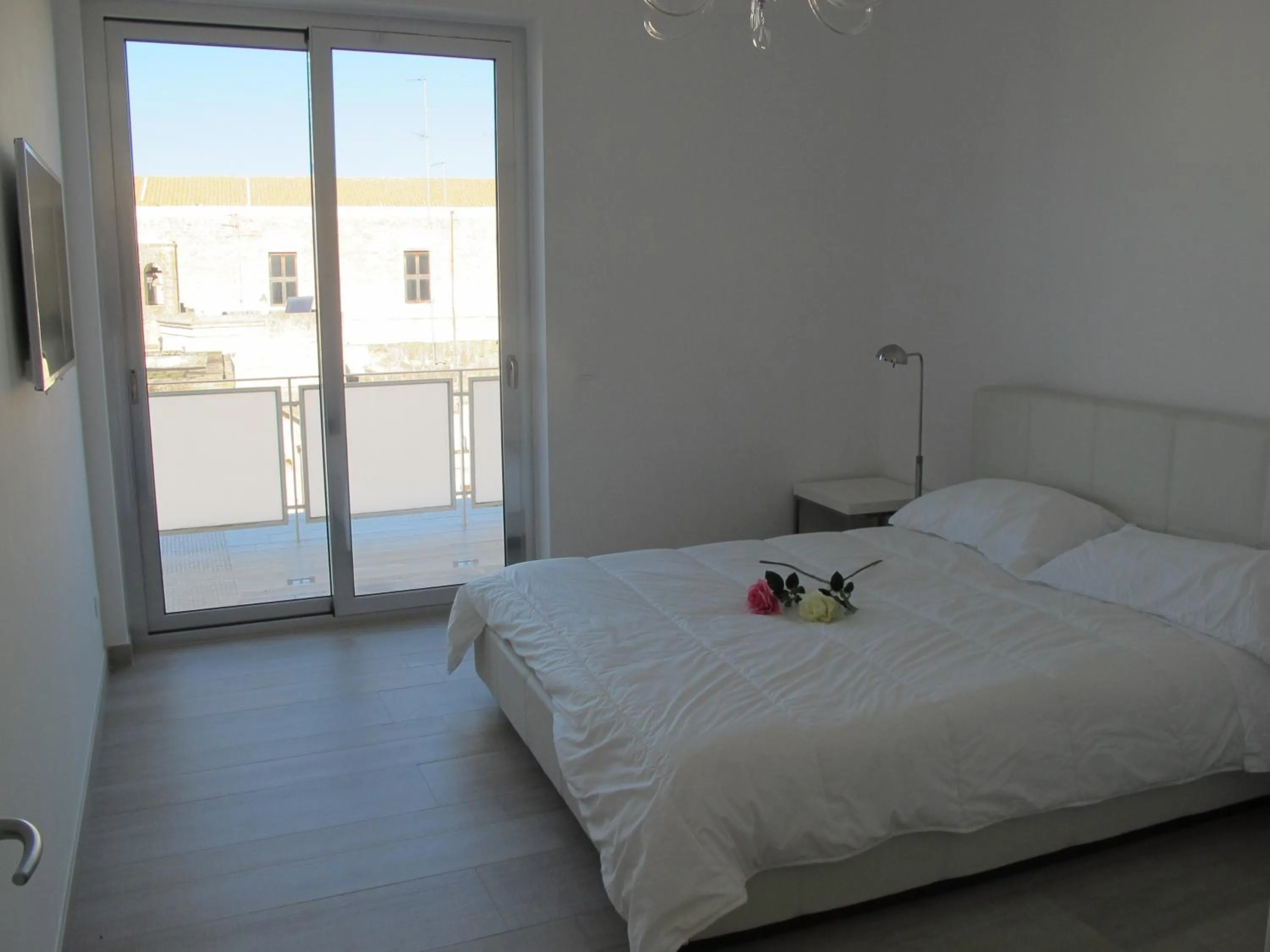 Bed in Penthouse Santa Croce