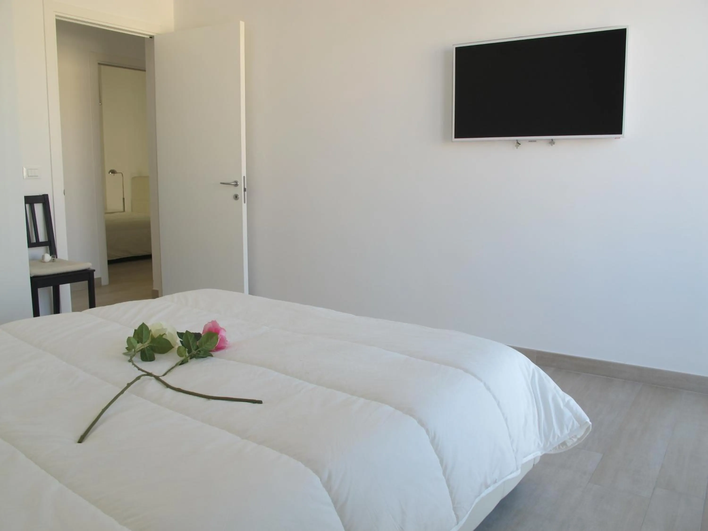 Bed in Penthouse Santa Croce