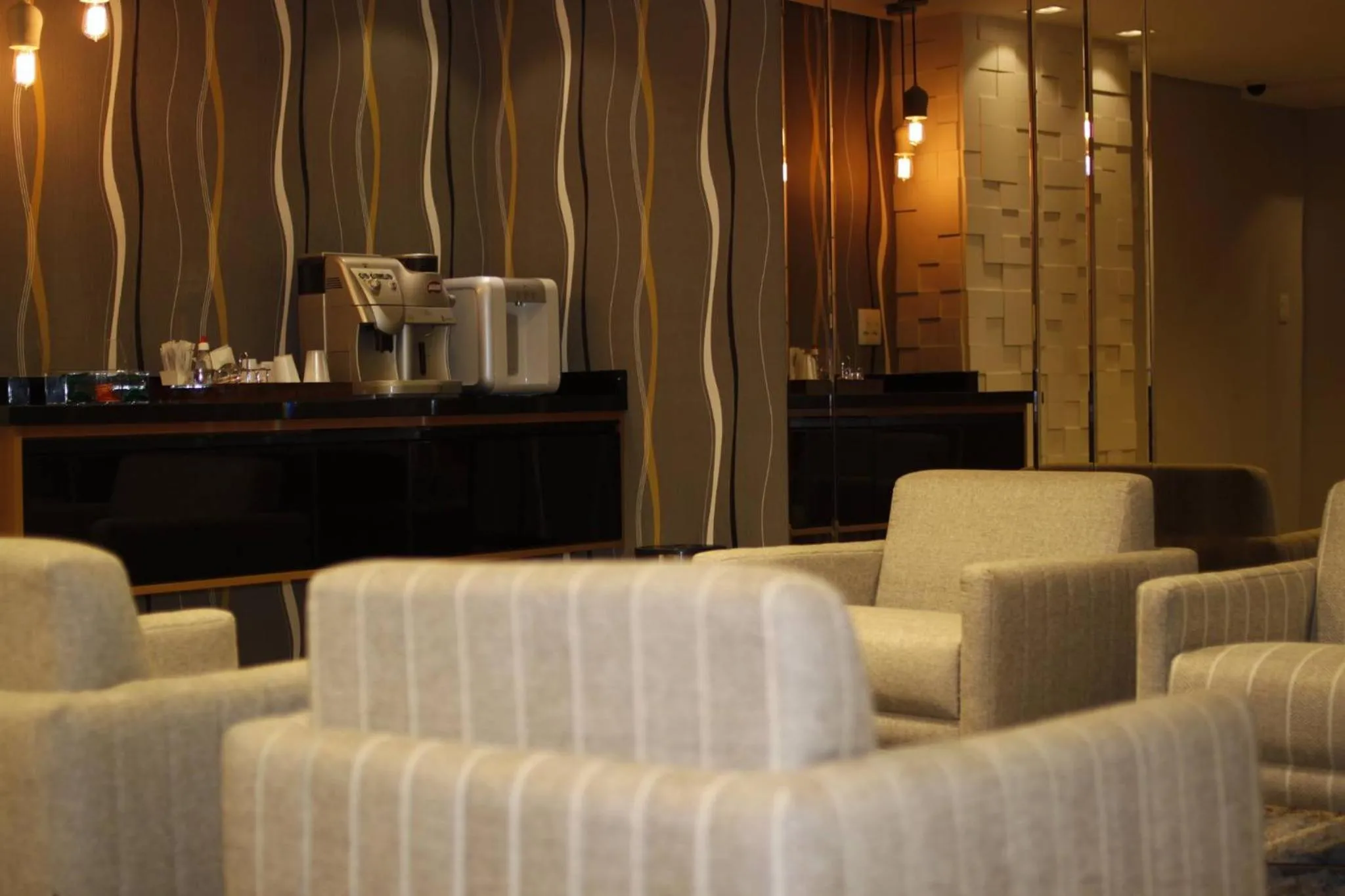 Communal lounge/ TV room in Millian Hotel