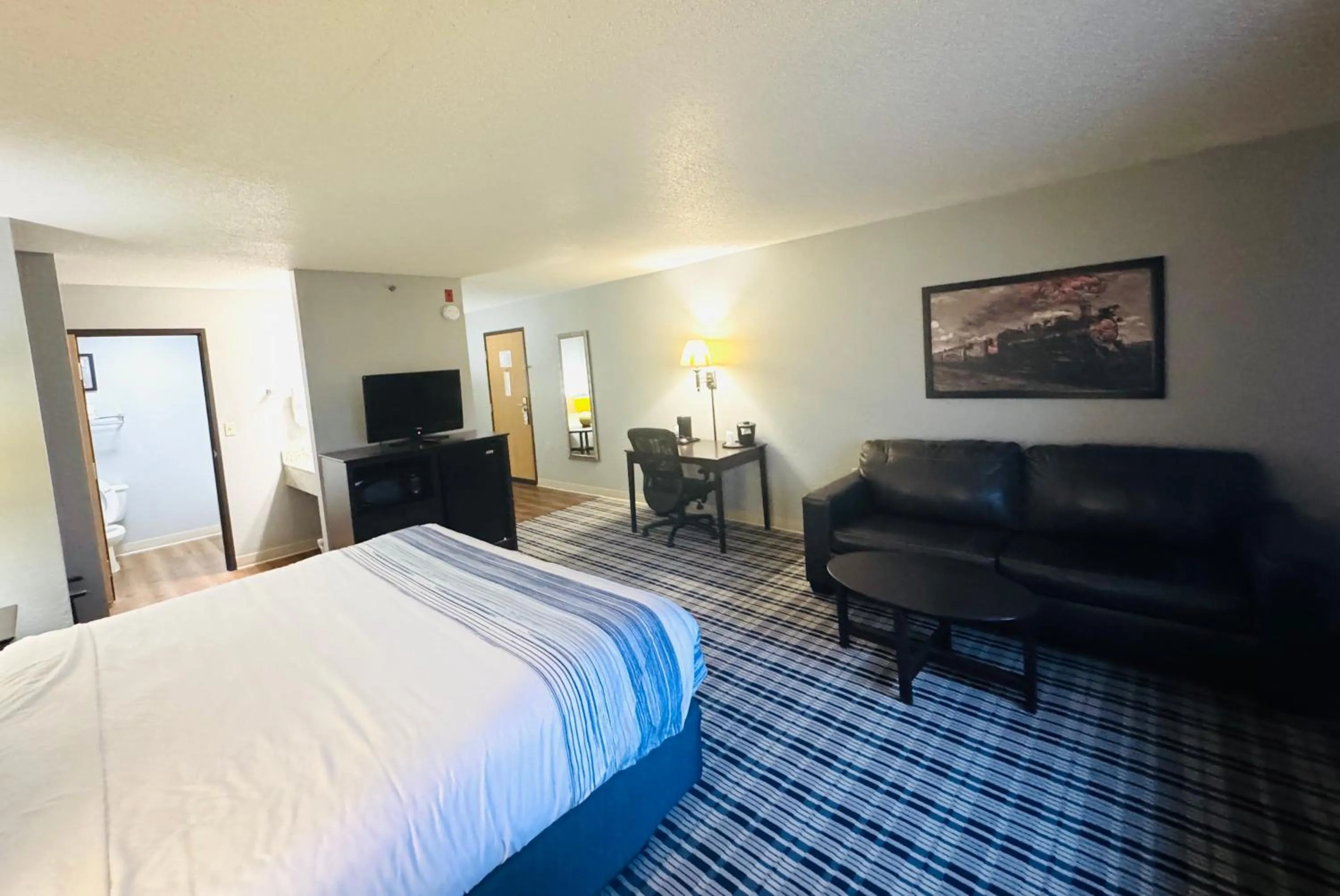 Bedroom, Bed in AmericInn by Wyndham Ames