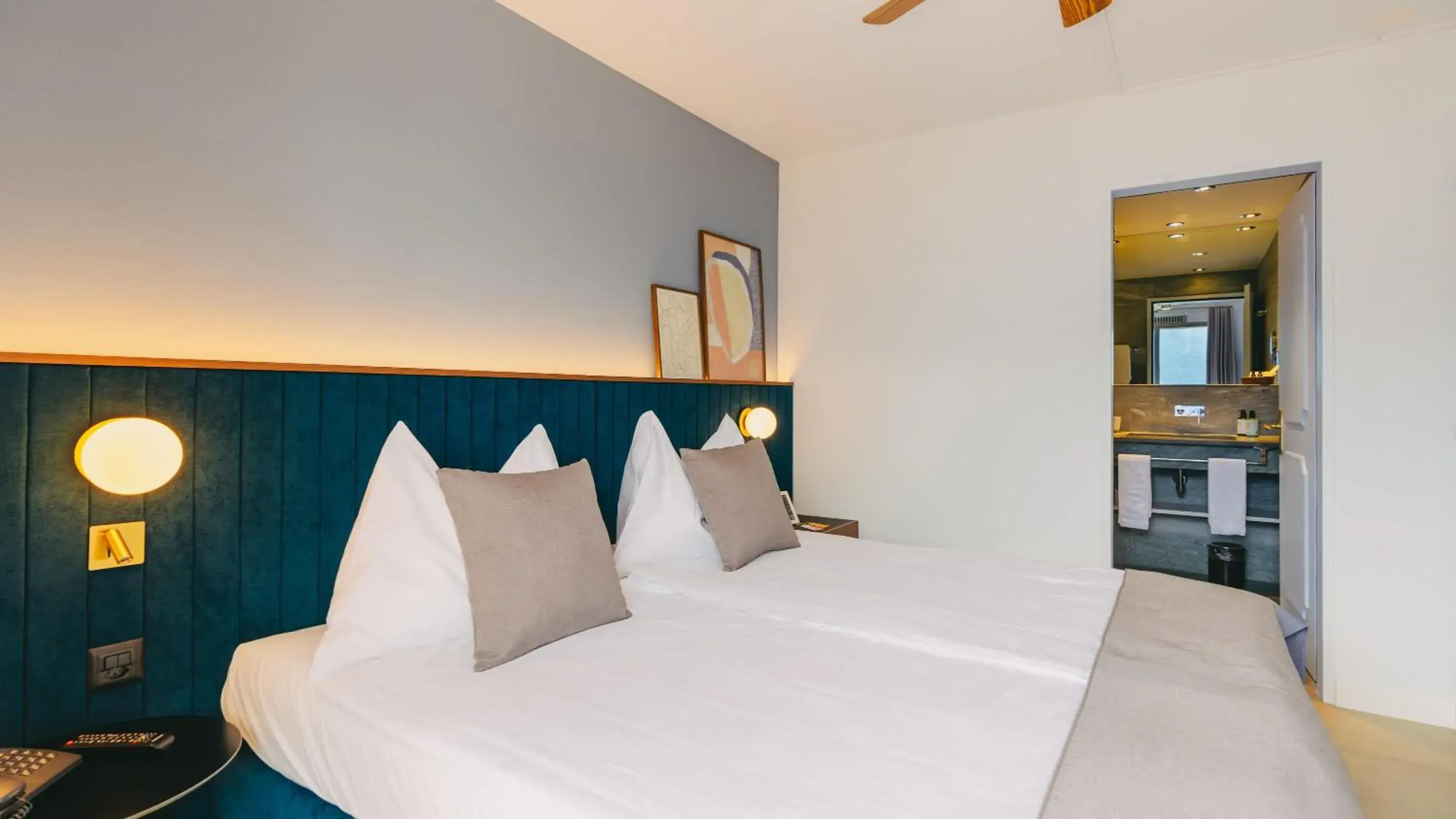 Bedroom, Bed in Boutique Hotel Sunstar Brissago am Lago Maggiore Bedroom, Bed in Boutique Hotel Sunstar Brissago am Lago Maggiore