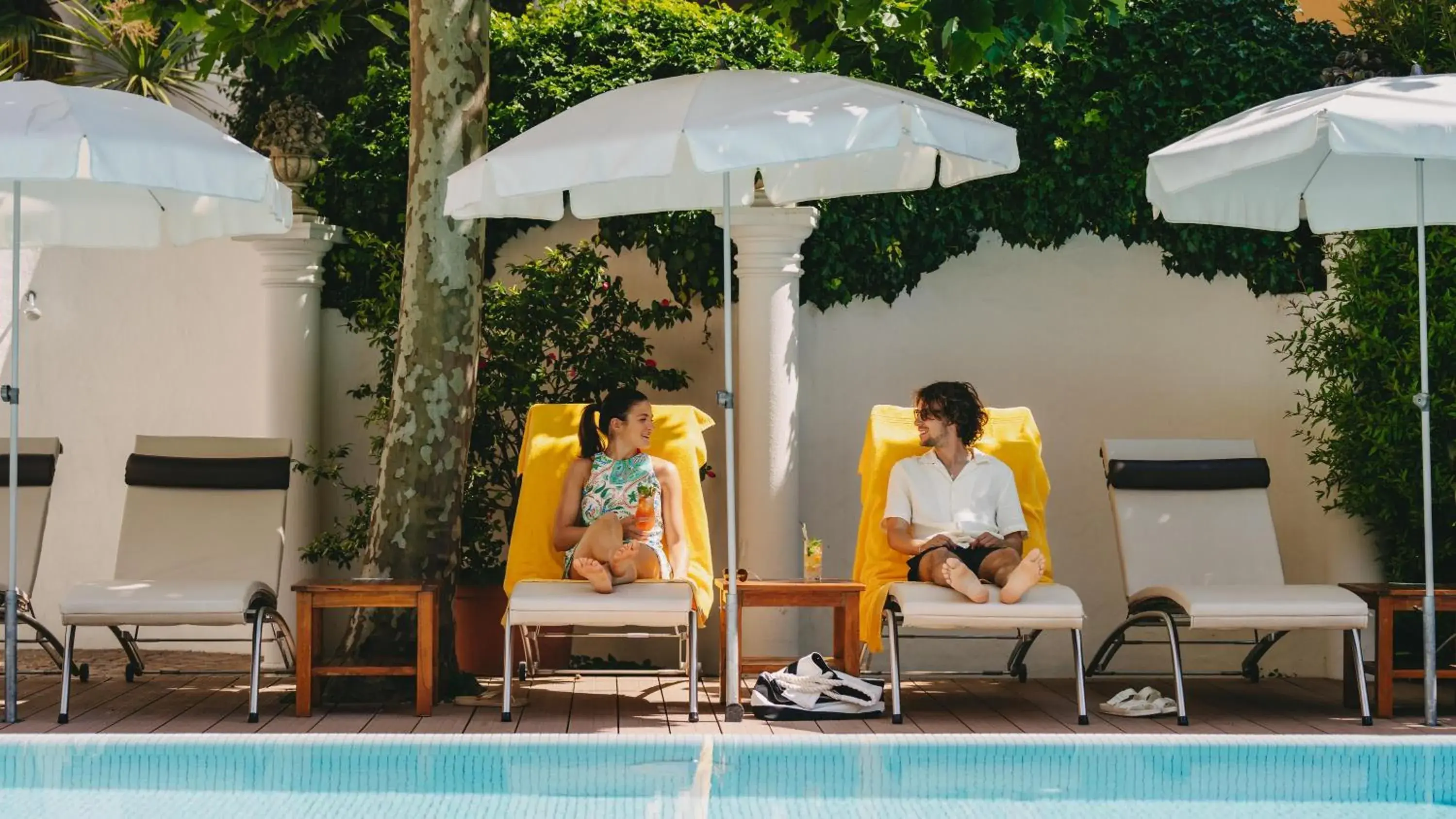 Pool view in Boutique Hotel Sunstar Brissago am Lago Maggiore Pool view in Boutique Hotel Sunstar Brissago am Lago Maggiore
