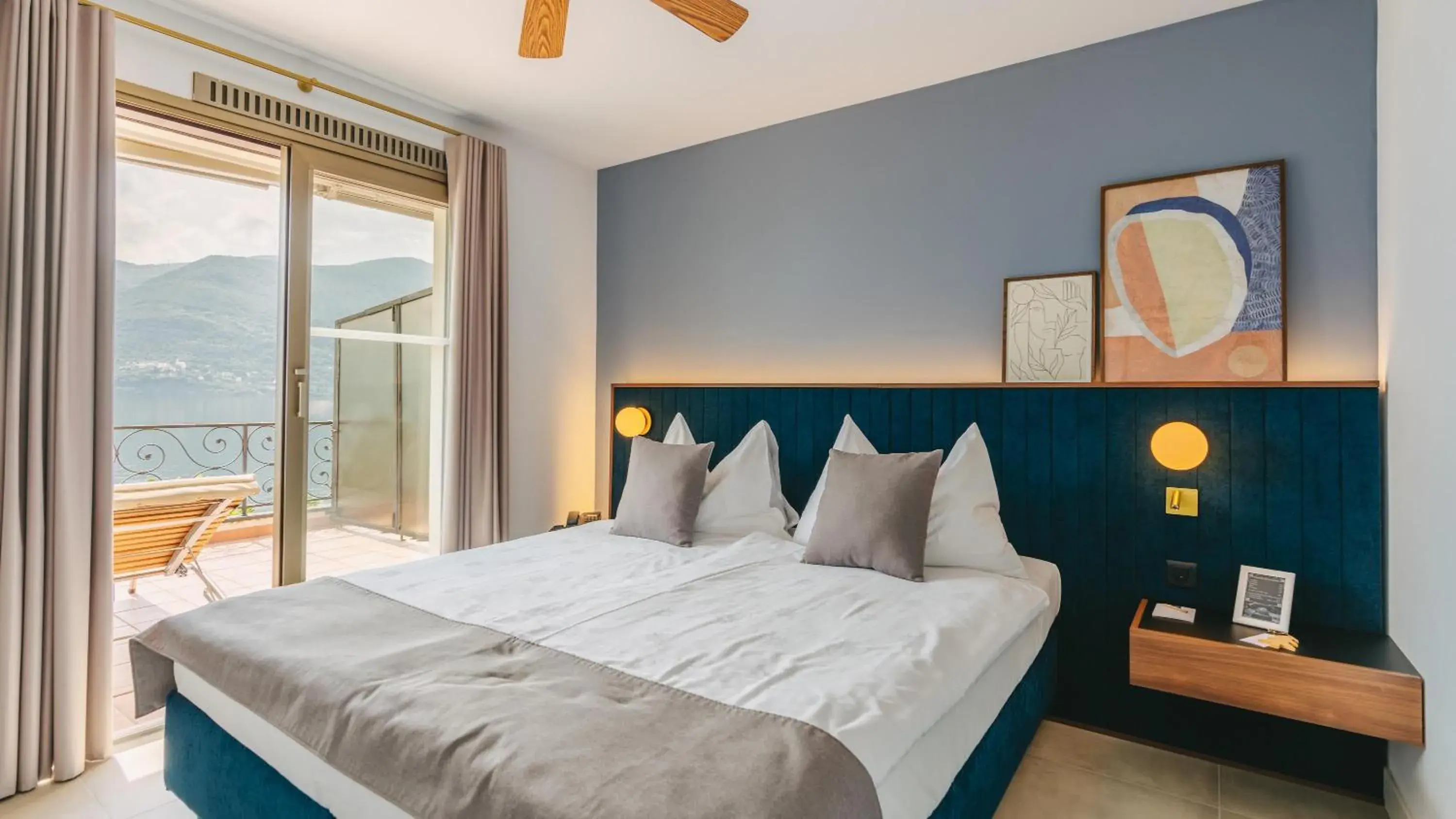 Bedroom, Bed in Boutique Hotel Sunstar Brissago am Lago Maggiore Bedroom, Bed in Boutique Hotel Sunstar Brissago am Lago Maggiore