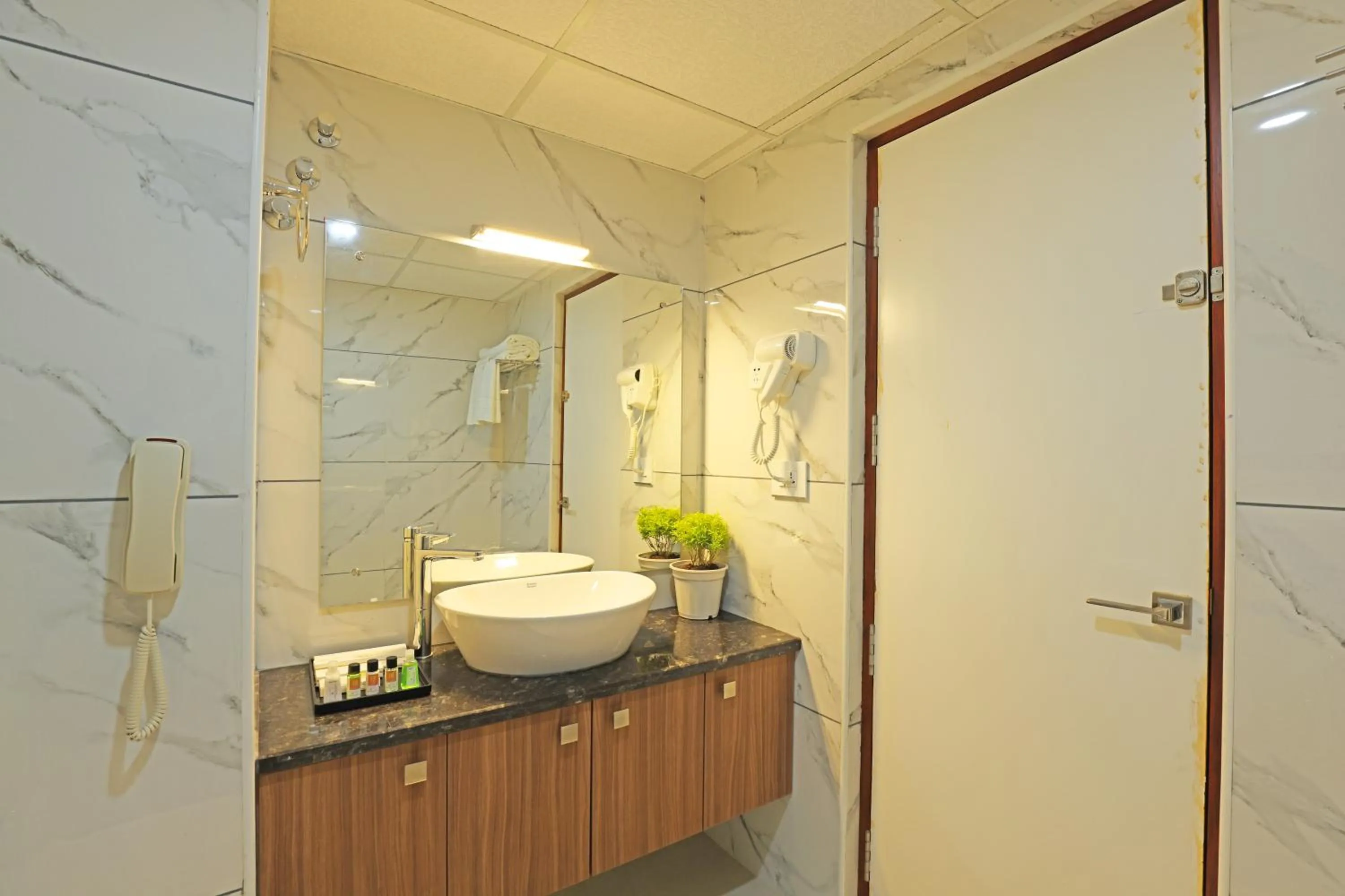 Bathroom in Krishnavalsam Regency