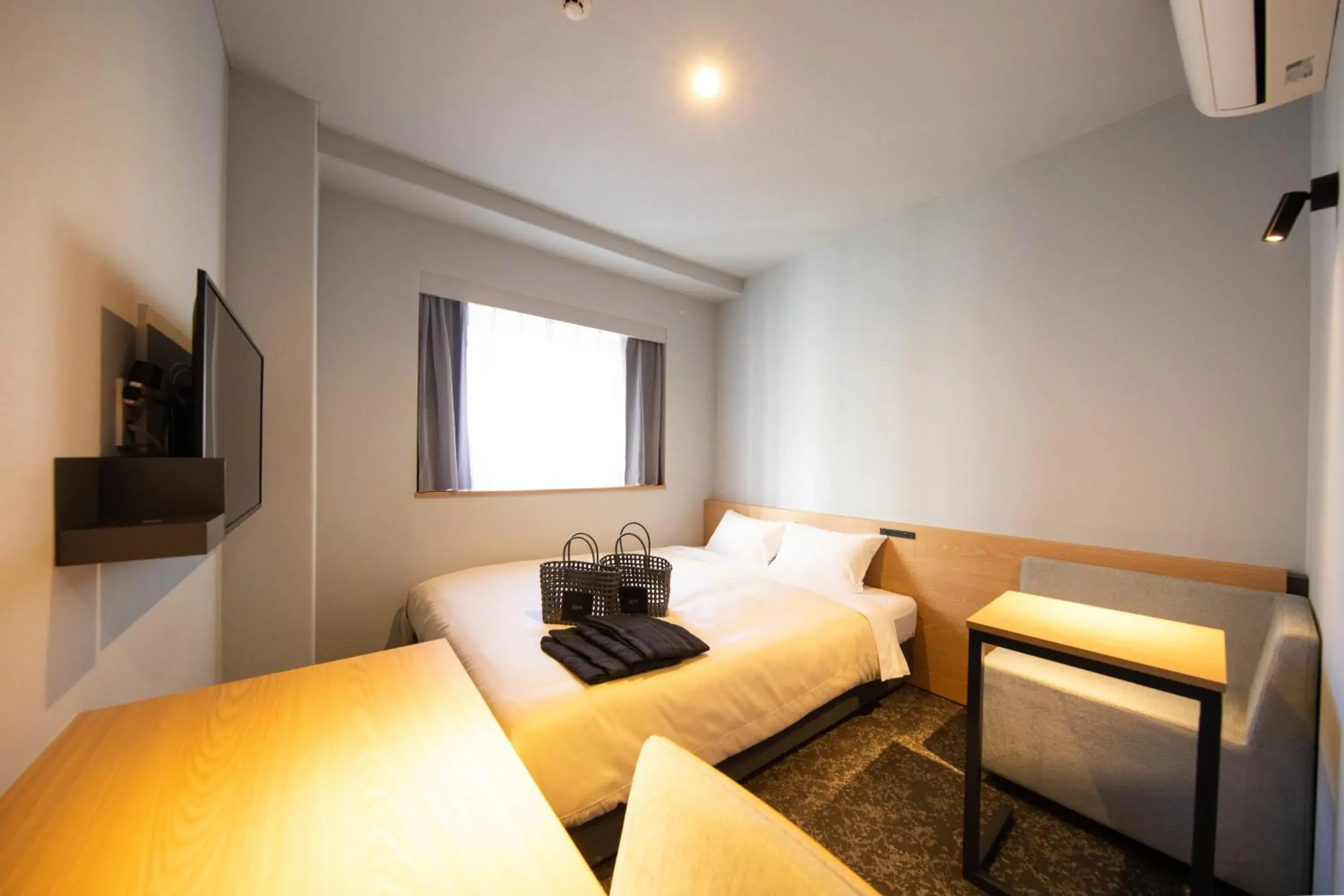 Photo of the whole room, Bed in AMANEK Inn Beppu Photo of the whole room, Bed in AMANEK Inn Beppu