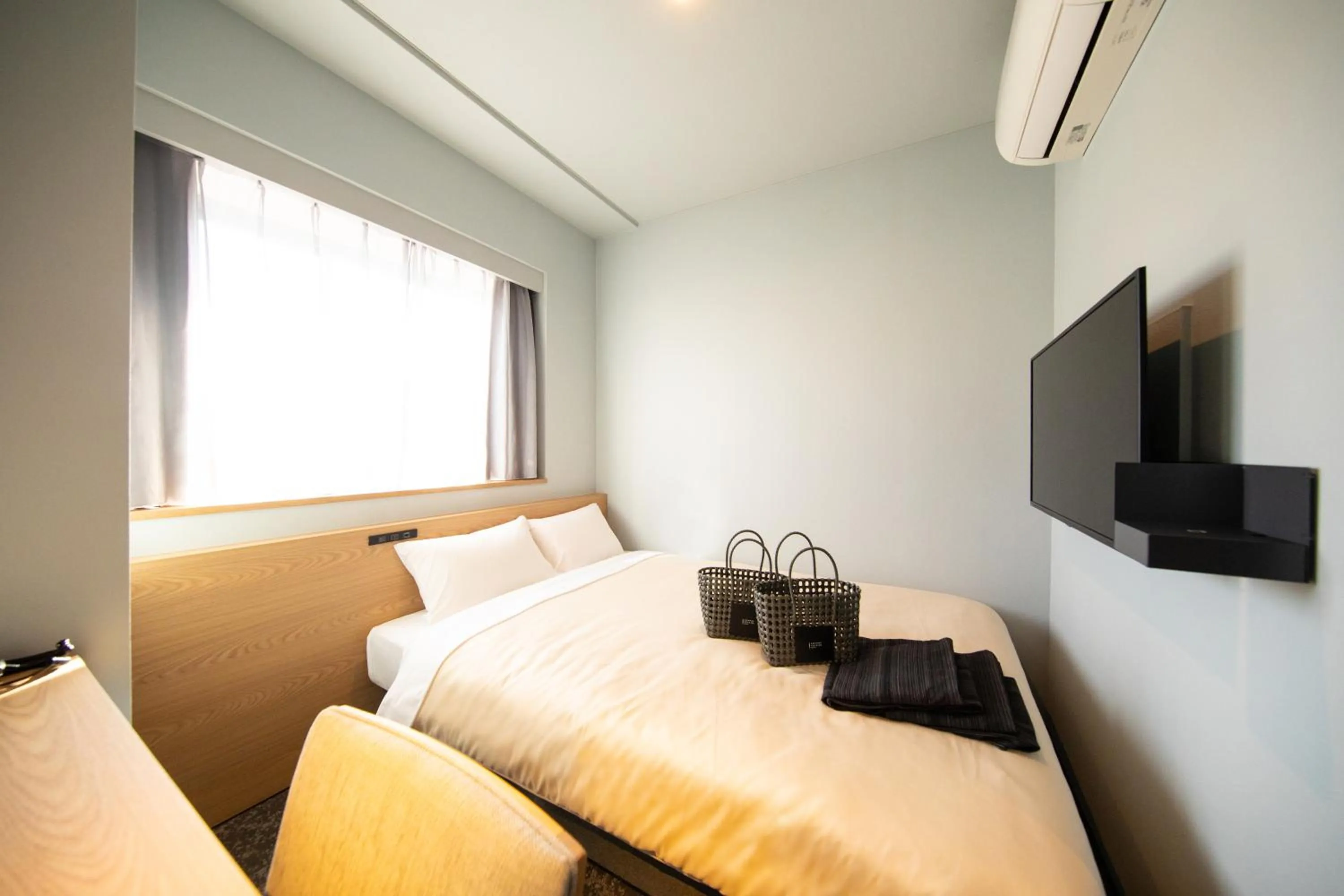 Photo of the whole room, Bed in AMANEK Inn Beppu