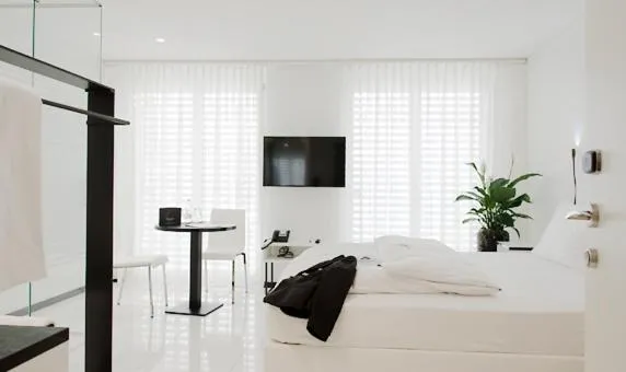 Photo of the whole room, Bed in Boutiquehotel Thessoni Classic & Self service Residence Home Zürich