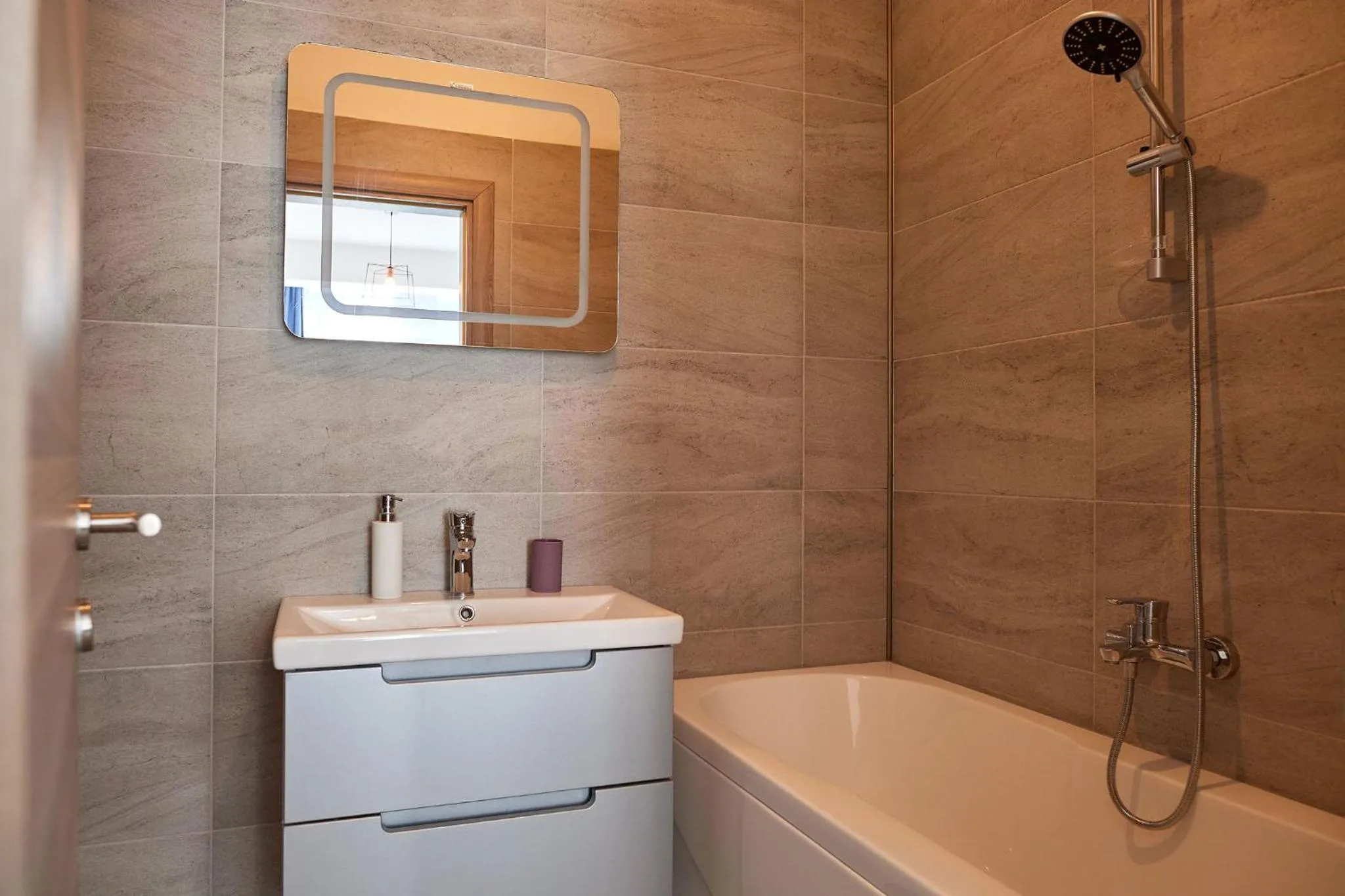 Bathroom in Glamour Sea view Family Apartments - Spa n Pools Resort